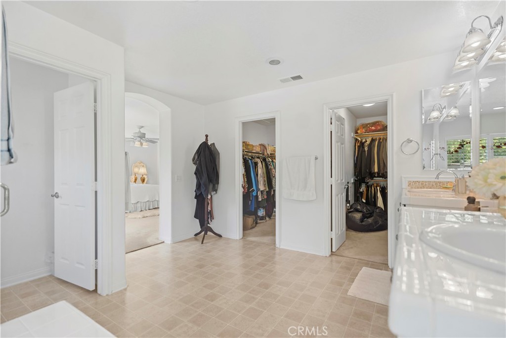 665 Barbre Lane Corona, CA 92879 - Photo 35 of 57 Master bathroom + walk-in closet
