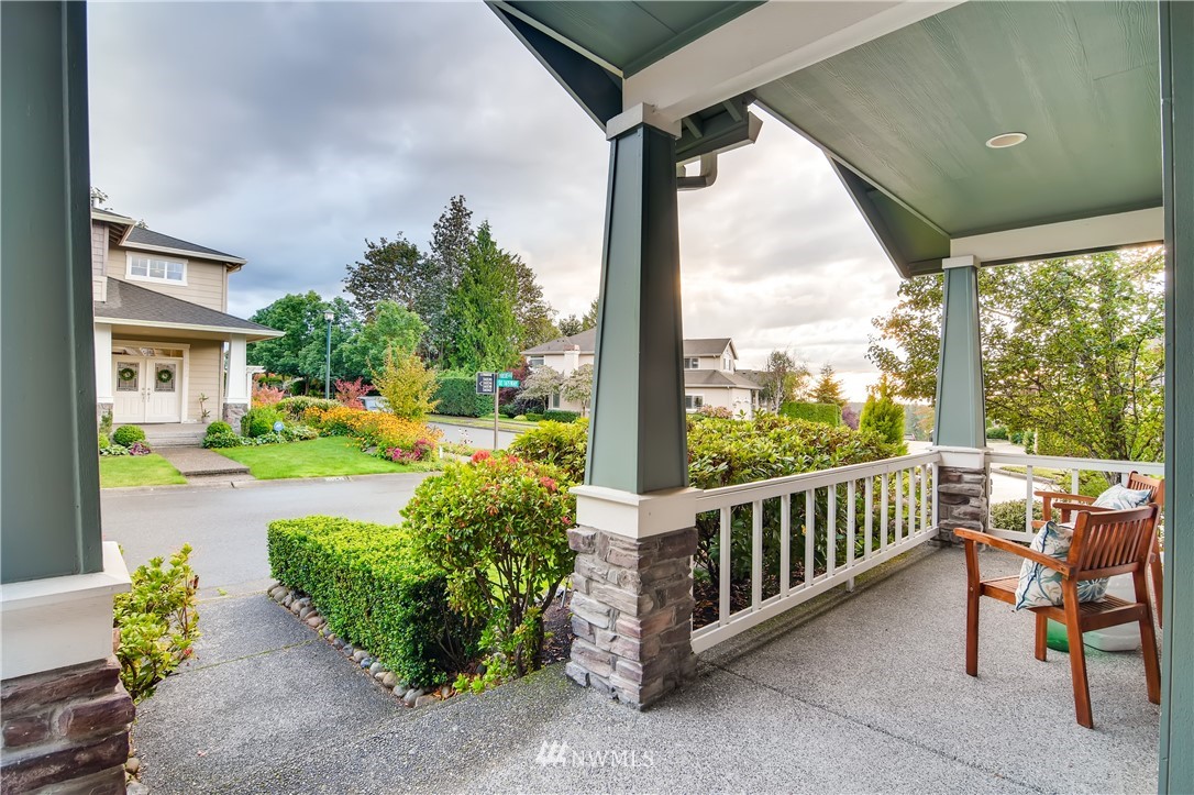 16530 Parkside Way Southeast Renton, WA 98058 - Photo 2 of 25 a view of a porch with furniture and a yard