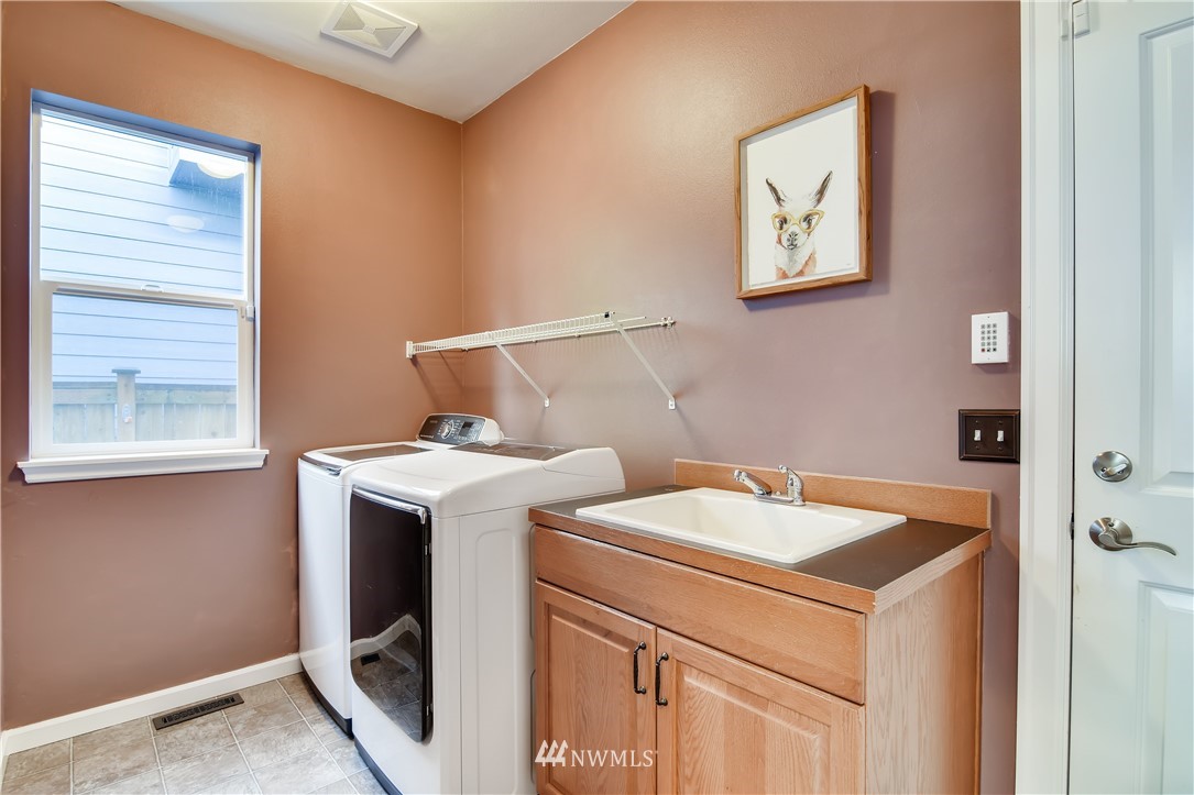 16530 Parkside Way Southeast Renton, WA 98058 - Photo 23 of 25 a utility room with dryer and washer