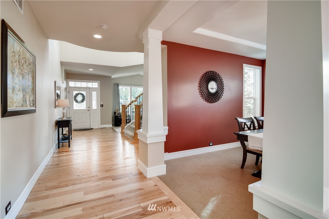 16530 Parkside Way Southeast Renton, WA 98058 - Photo 24 of 25 a view of a livingroom with furniture and wooden floor