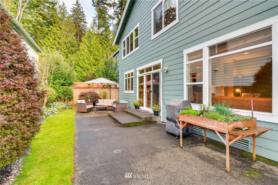 16530 Parkside Way Southeast Renton, WA 98058 - Photo 25 of 25 a backyard of a house with barbeque oven table and chairs
