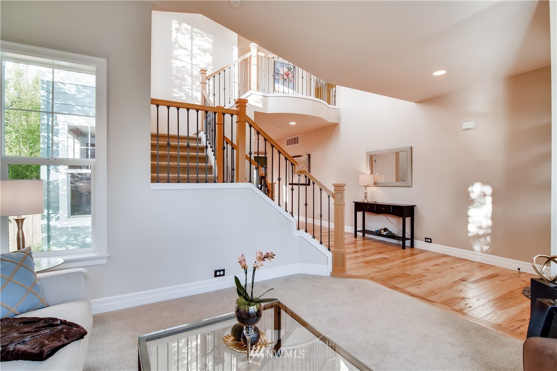 16530 Parkside Way Southeast Renton, WA 98058 - Photo 5 of 25 a view of entryway livingroom and hall with wooden floor