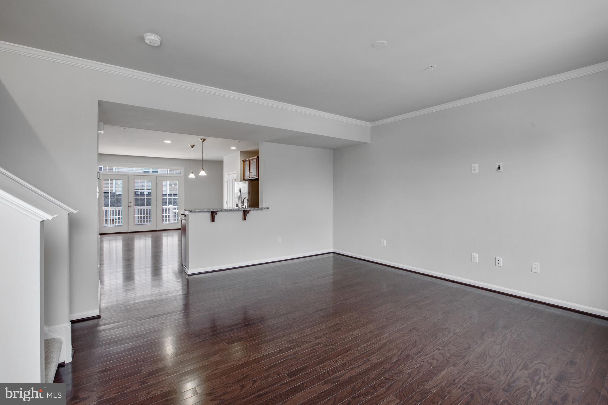 7873 Wormans Mill Road Frederick, MD 21701 - Photo 13 of 30 a view of a kitchen with wooden floor