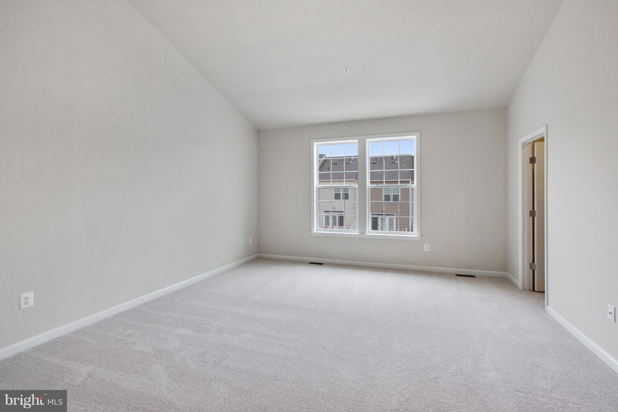 7873 Wormans Mill Road Frederick, MD 21701 - Photo 15 of 30 an empty room with windows