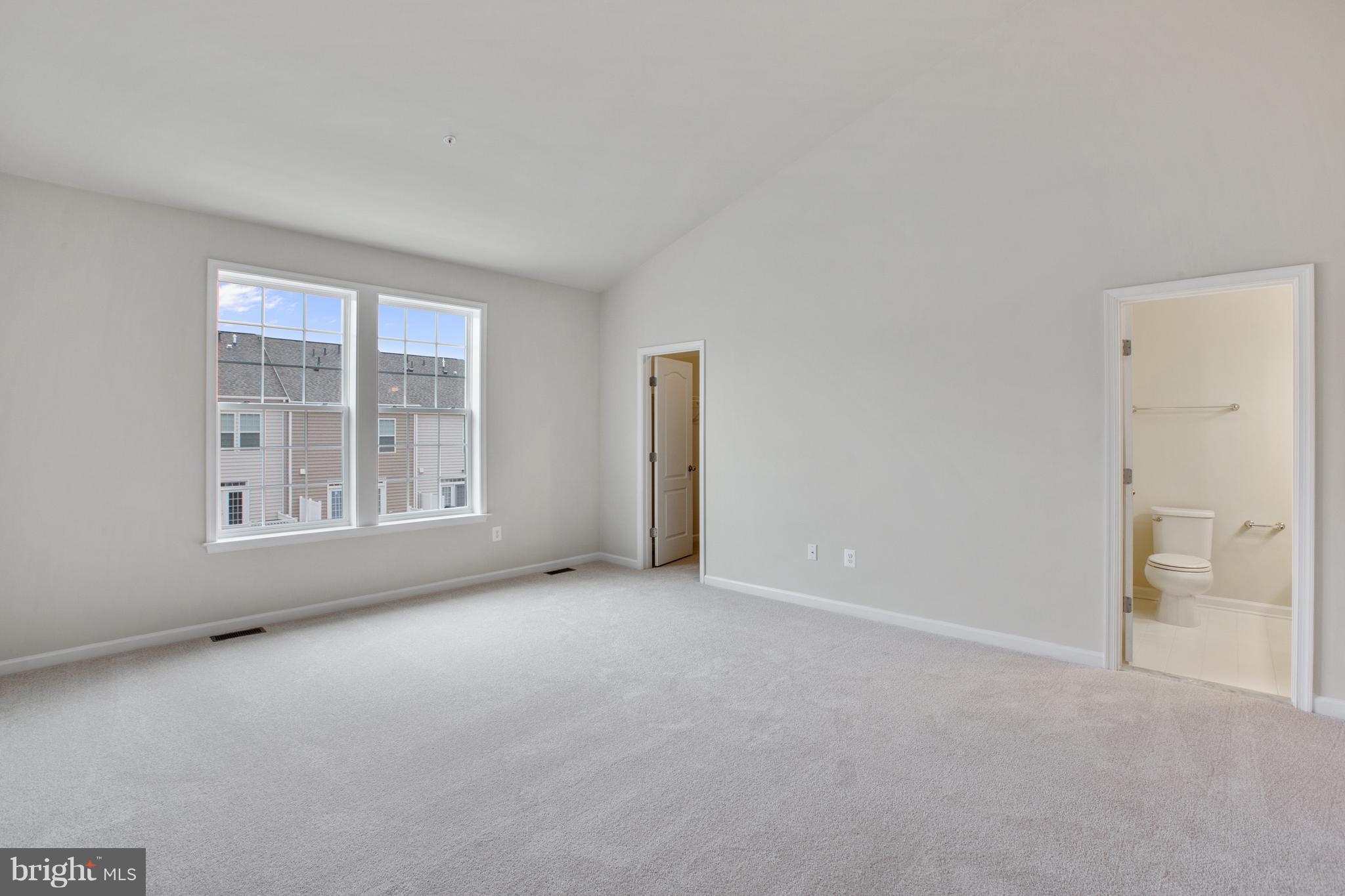 7873 Wormans Mill Road Frederick, MD 21701 - Photo 16 of 30 an empty room with windows and yard