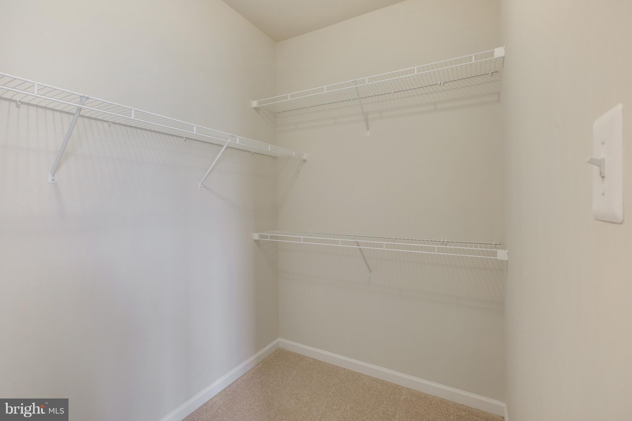 7873 Wormans Mill Road Frederick, MD 21701 - Photo 18 of 30 a view of an empty walk in closet