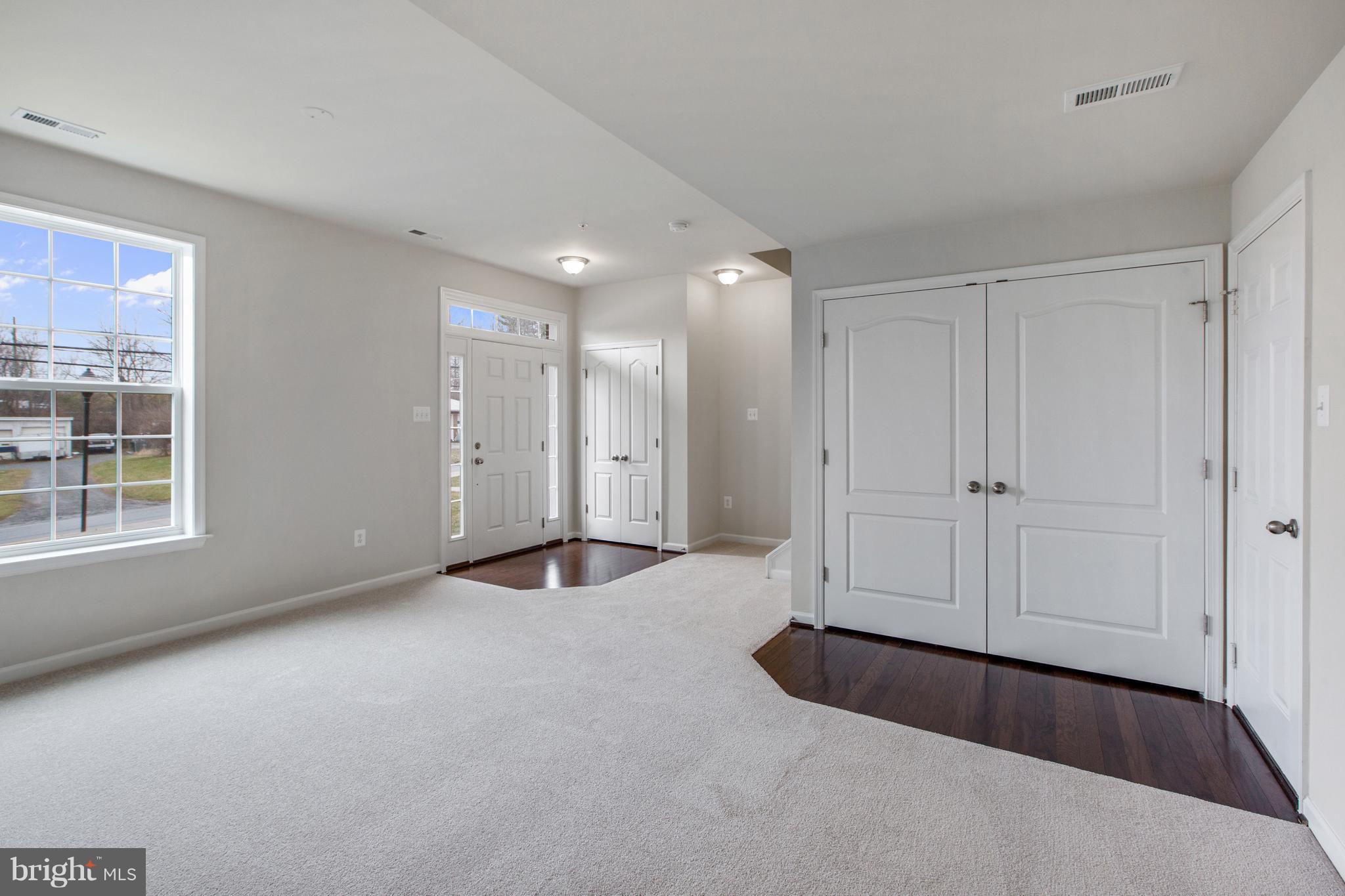 7873 Wormans Mill Road Frederick, MD 21701 - Photo 3 of 30 a view of an empty room with a window