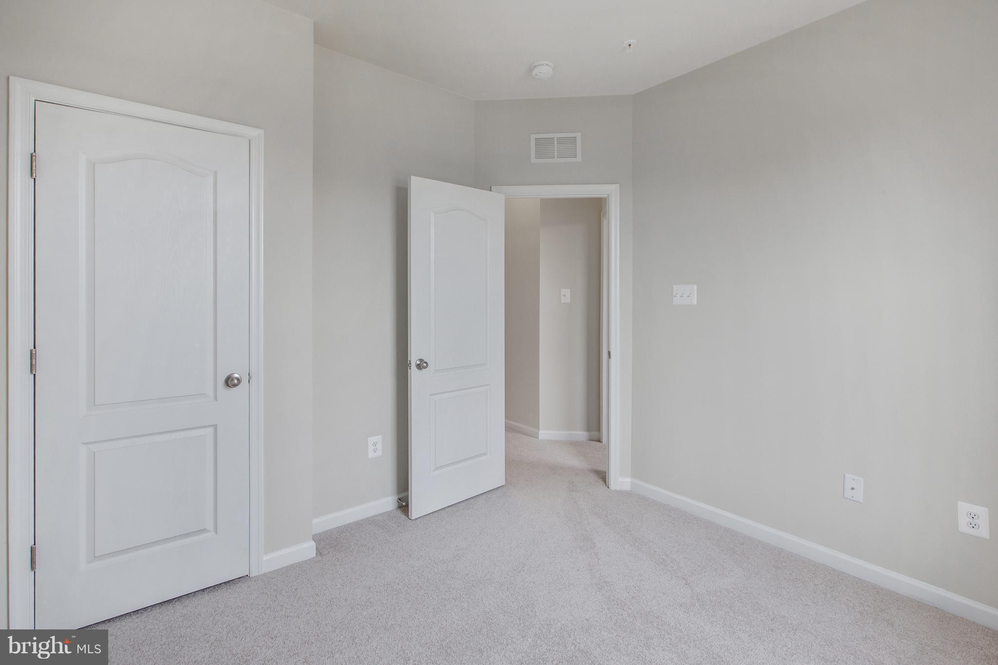7873 Wormans Mill Road Frederick, MD 21701 - Photo 23 of 30 a view of an empty room and closet area