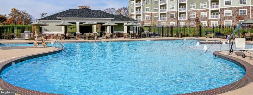 7873 Wormans Mill Road Frederick, MD 21701 - Photo 29 of 30 a swimming pool view with a outdoor seating