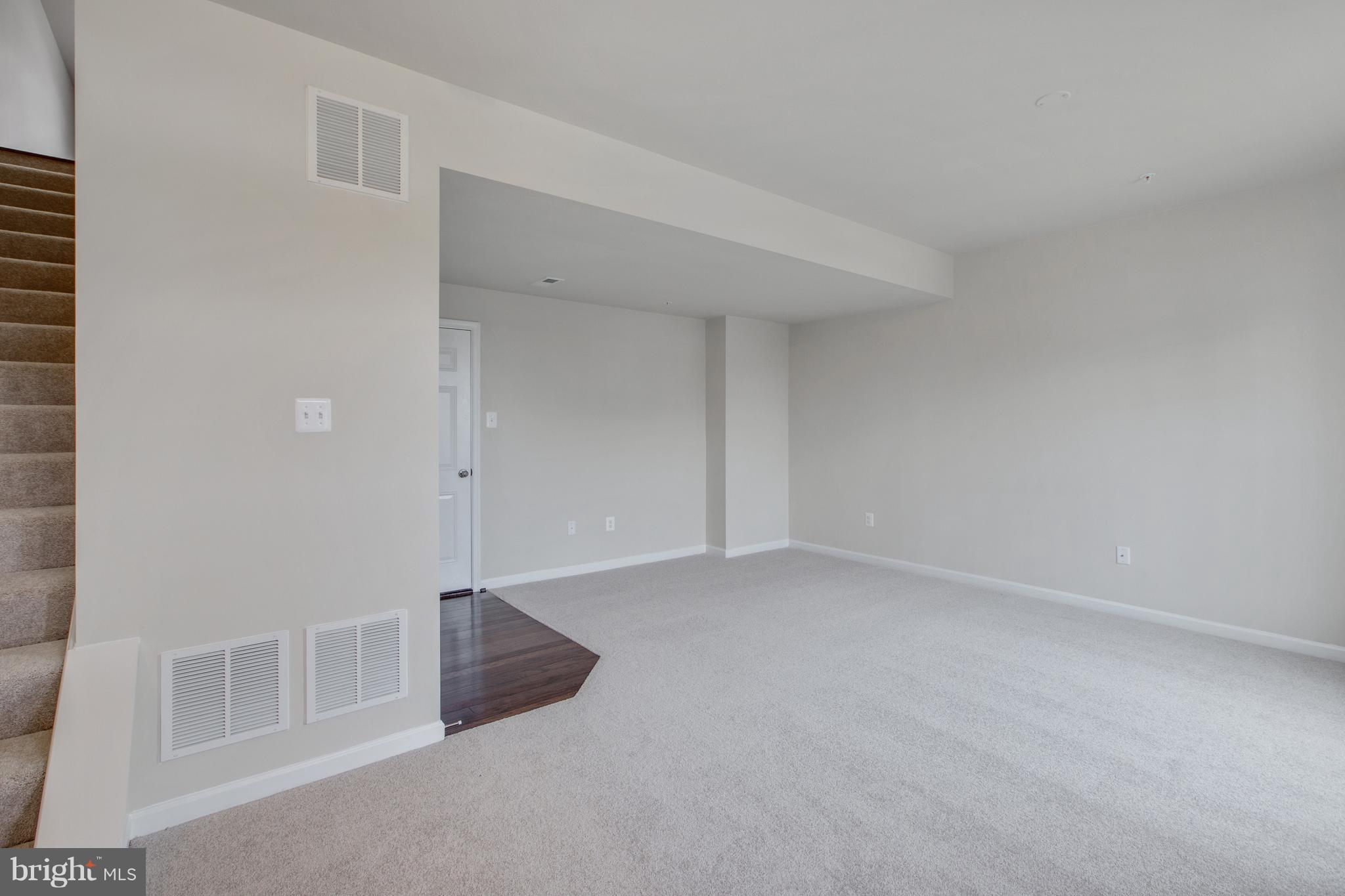 7873 Wormans Mill Road Frederick, MD 21701 - Photo 4 of 30 an empty room with white walls