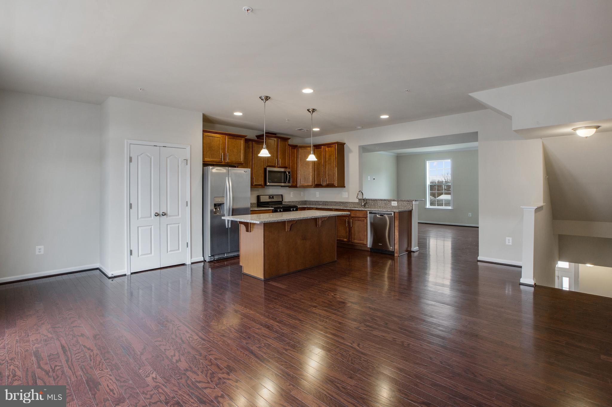 7873 Wormans Mill Road Frederick, MD 21701 - Photo 7 of 30 a view of kitchen with cabinets and wooden floor