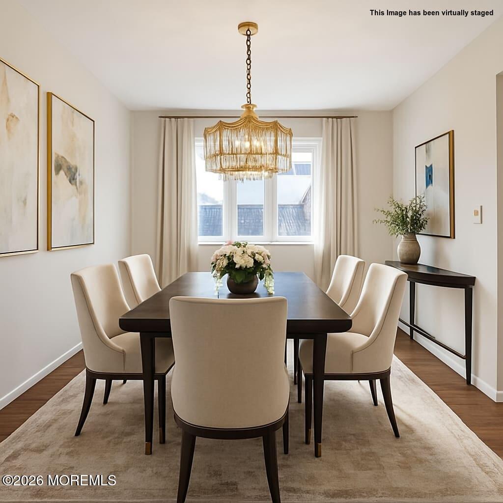 1 Sudbury Road Morganville, NJ 07751 - Photo 11 of 43 a view of a dining room with furniture window and outside view