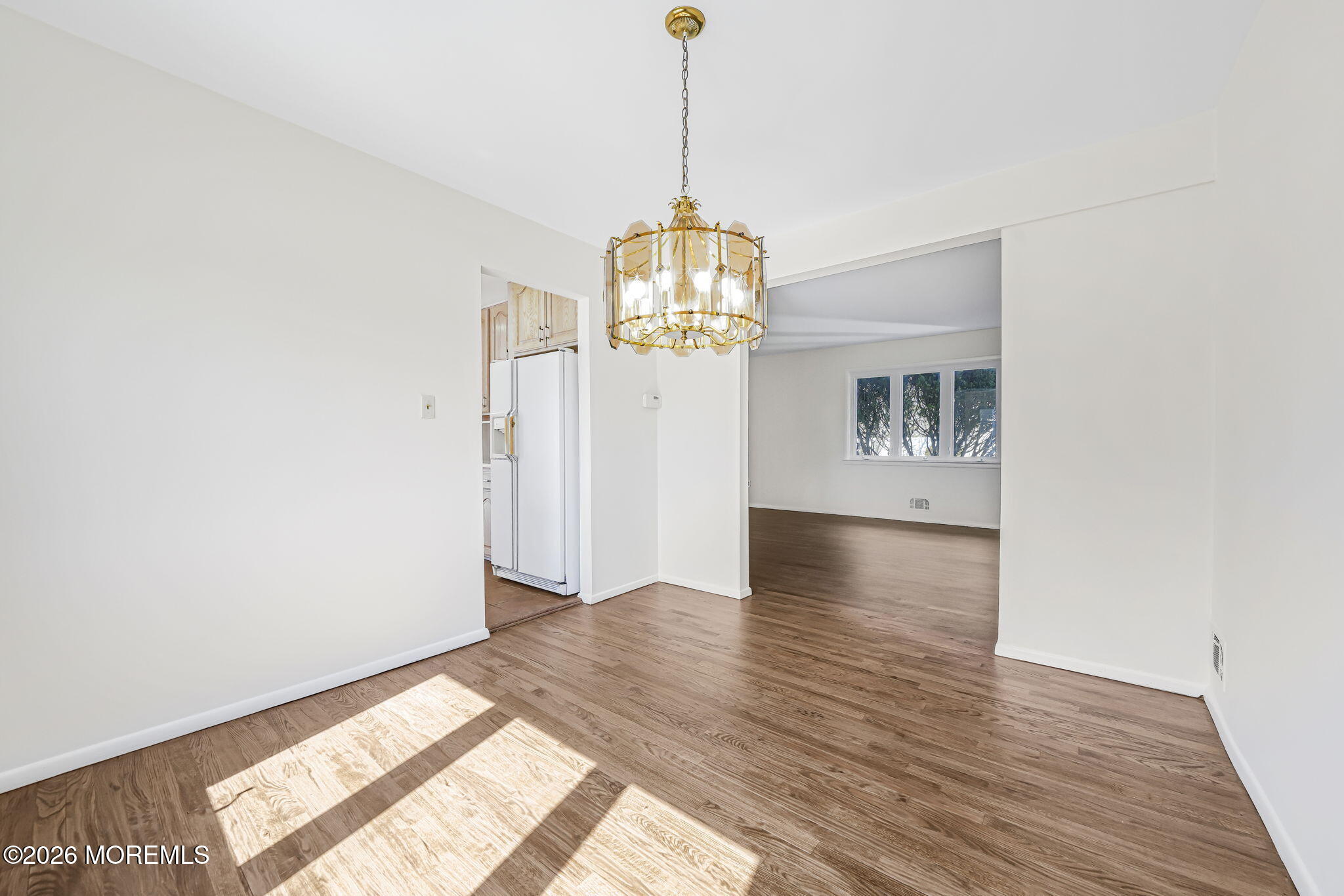1 Sudbury Road Morganville, NJ 07751 - Photo 12 of 43 a view interior of a house wooden floor and a chandelier