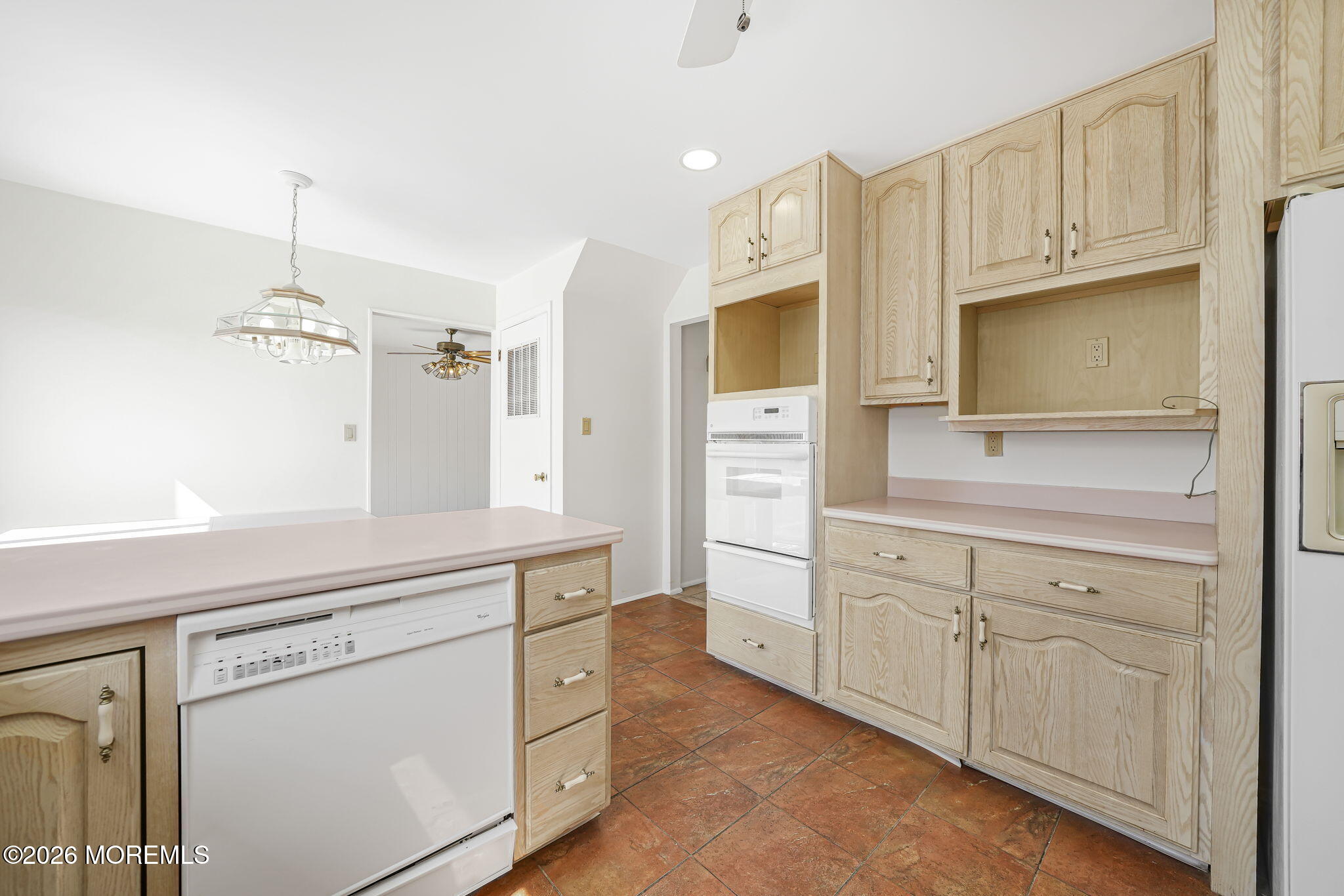 1 Sudbury Road Morganville, NJ 07751 - Photo 16 of 43 a kitchen with stainless steel appliances white cabinets and a sink
