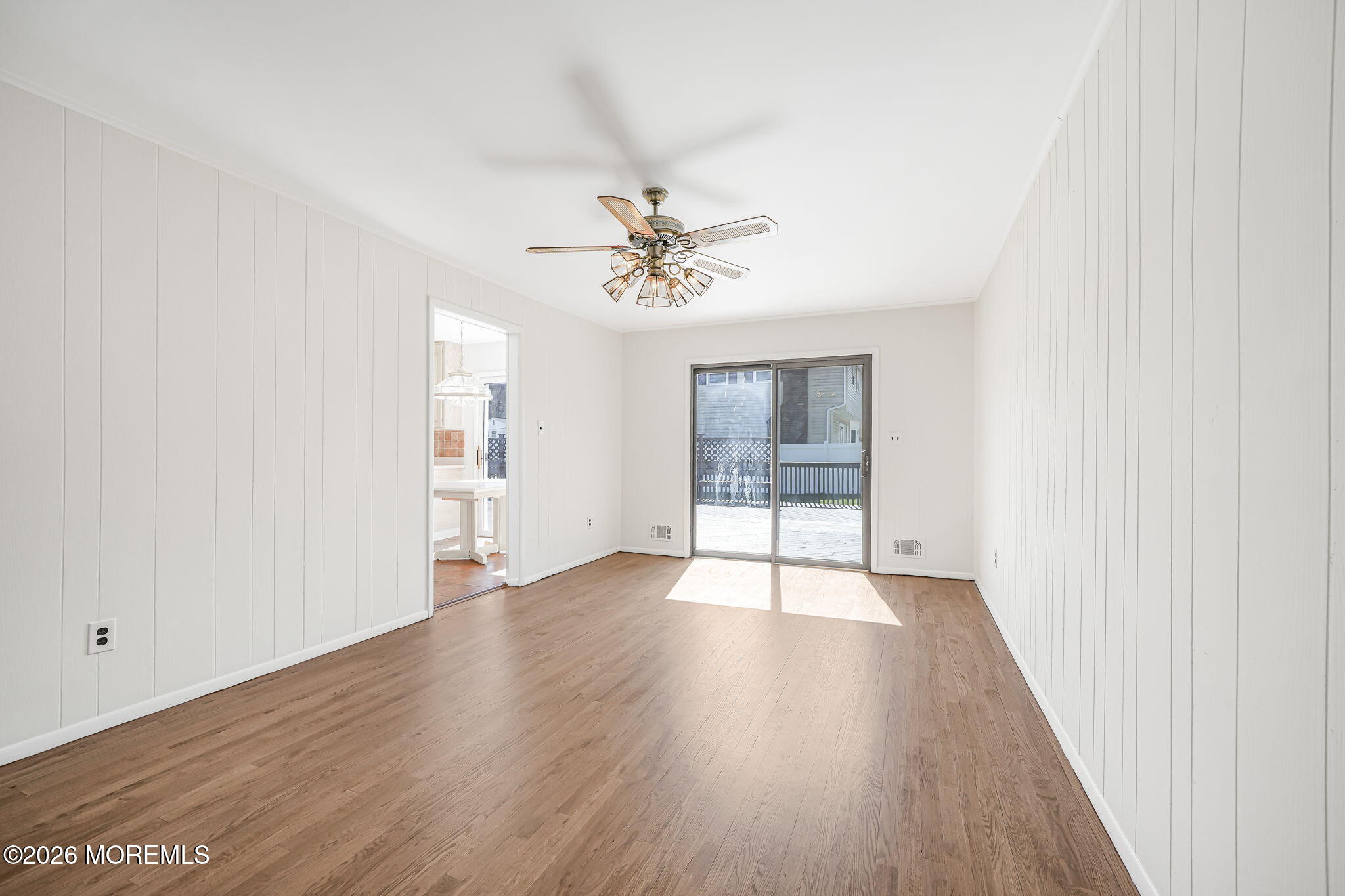 1 Sudbury Road Morganville, NJ 07751 - Photo 17 of 43 wooden floor in an empty room with a window