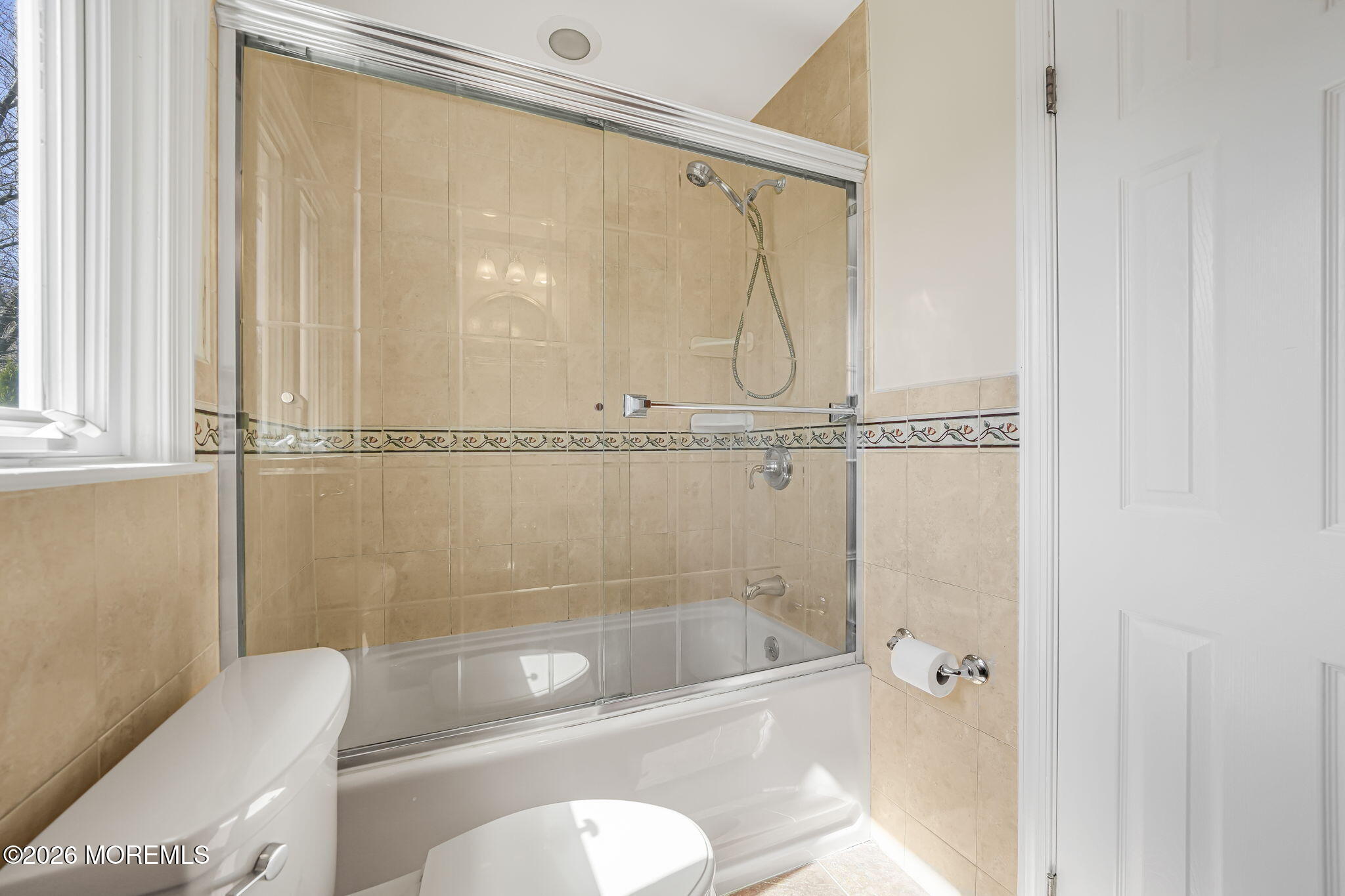 1 Sudbury Road Morganville, NJ 07751 - Photo 33 of 43 a bathroom with a shower a toilet and a bathtub