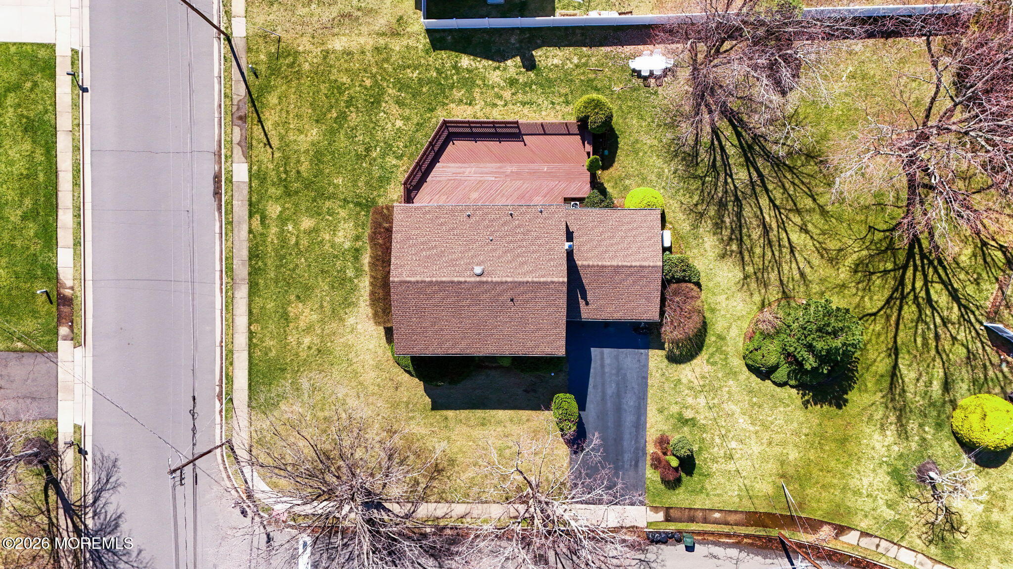 1 Sudbury Road Morganville, NJ 07751 - Photo 41 of 43 a aerial view of a house with a yard