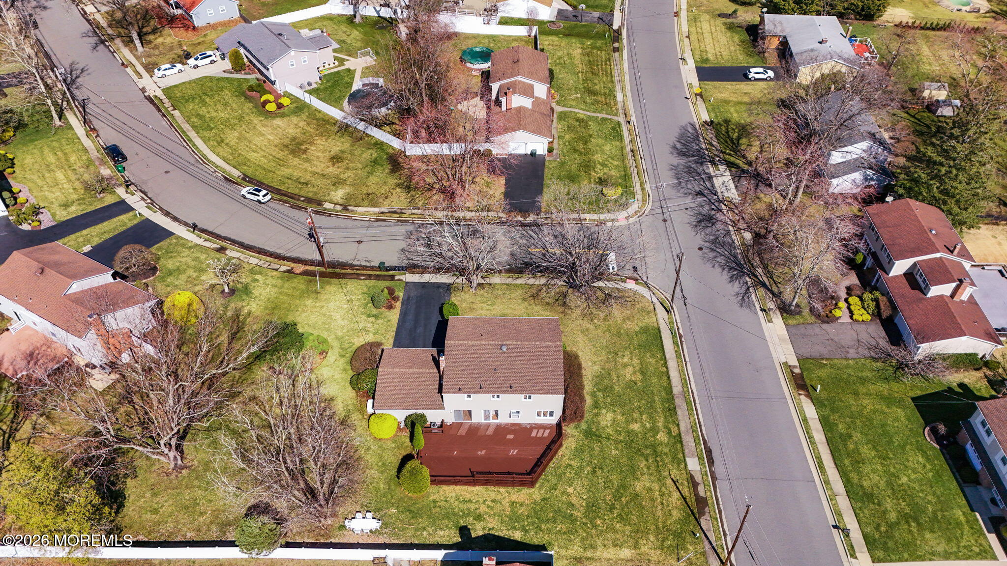 1 Sudbury Road Morganville, NJ 07751 - Photo 43 of 43 an aerial view of residential houses with outdoor space