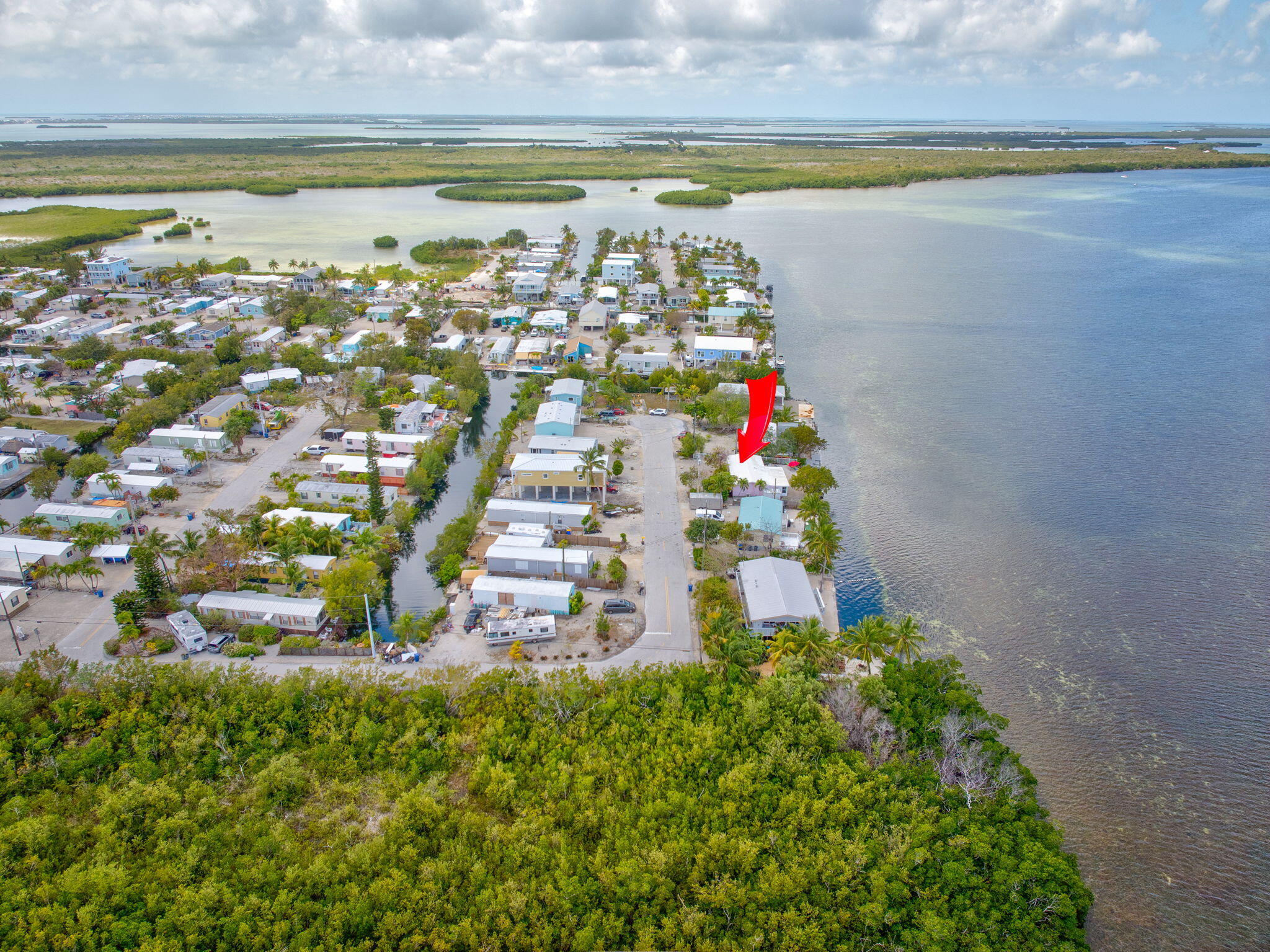 27941 Porgie Path Summerland Key, FL 33042 - Photo 12 of 18 a view of a city with an ocean and beach