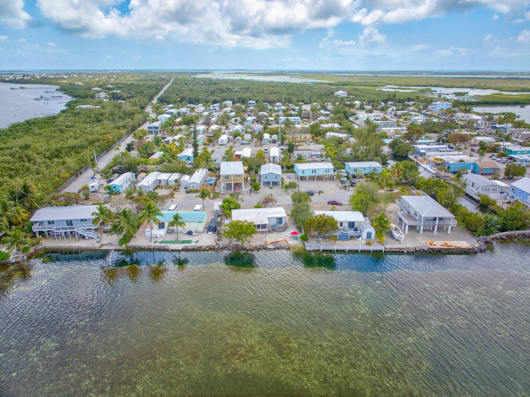 27941 Porgie Path Summerland Key, FL 33042 - Photo 15 of 18 an aerial view of residential houses with outdoor space and ocean view