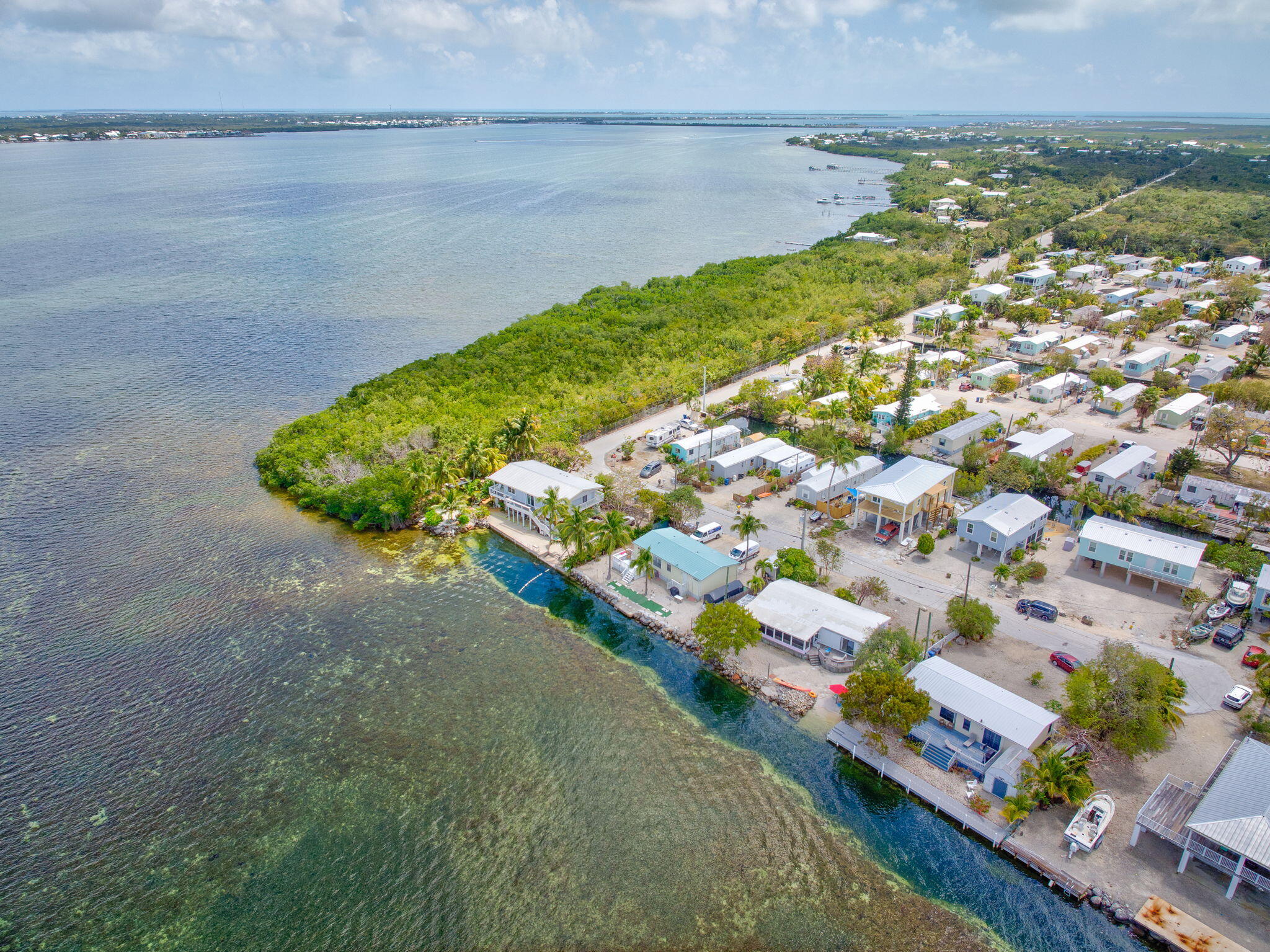 27941 Porgie Path Summerland Key, FL 33042 - Photo 17 of 18 a view of a lake with a city view