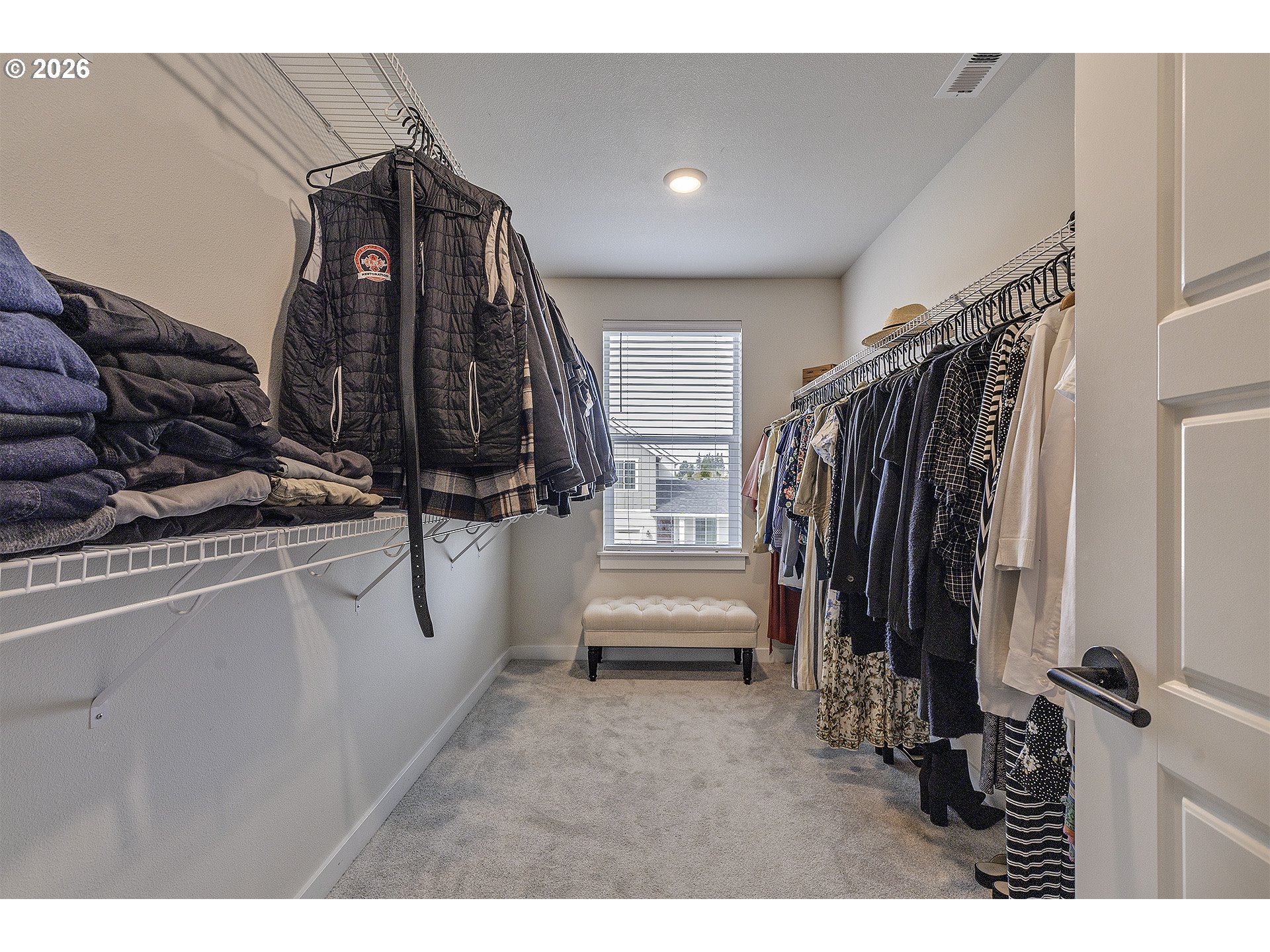 1156 Tansy Lane Canby, OR 97013 - Photo 23 of 35 a view of walk in closet with clothes and shoes