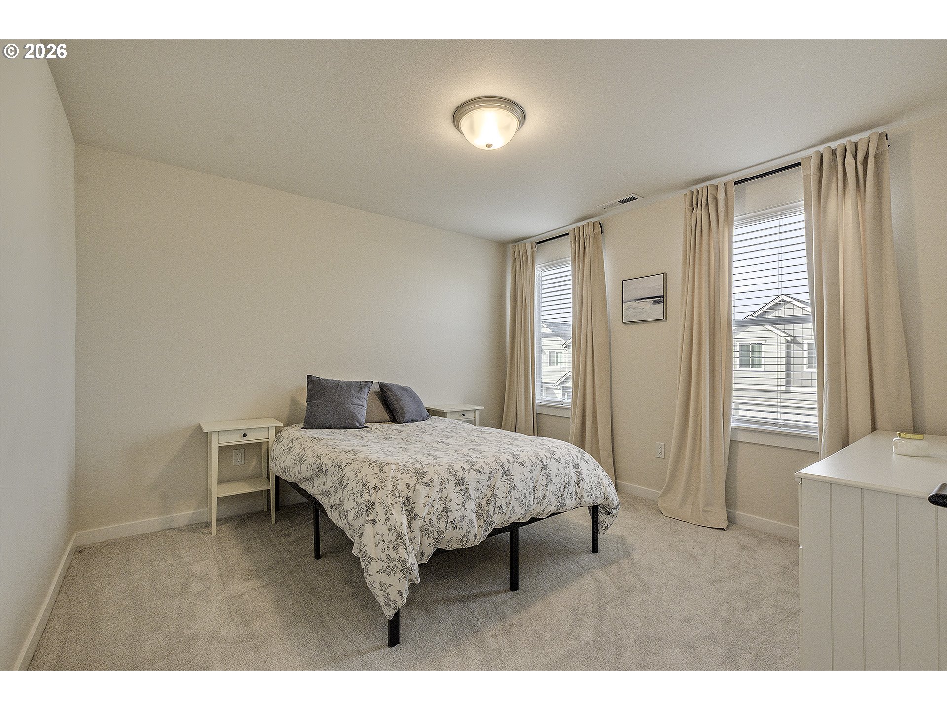 1156 Tansy Lane Canby, OR 97013 - Photo 24 of 35 a living room with a bed furniture and a window