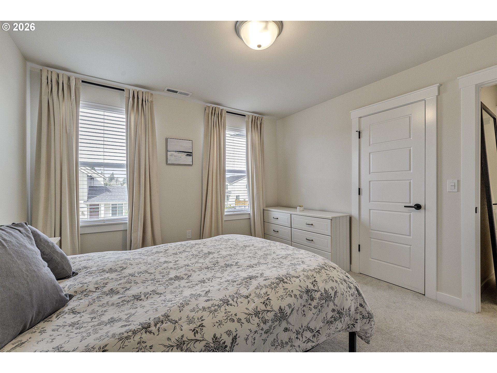 1156 Tansy Lane Canby, OR 97013 - Photo 25 of 35 a bedroom with a bed and a window