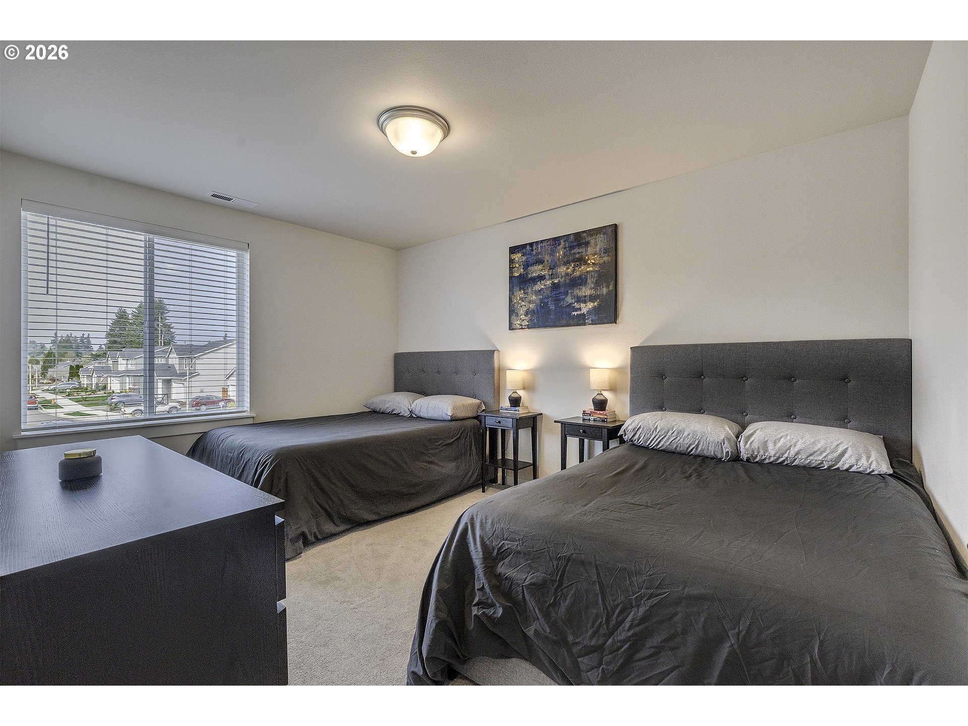1156 Tansy Lane Canby, OR 97013 - Photo 26 of 35 a bedroom with two beds and a large window