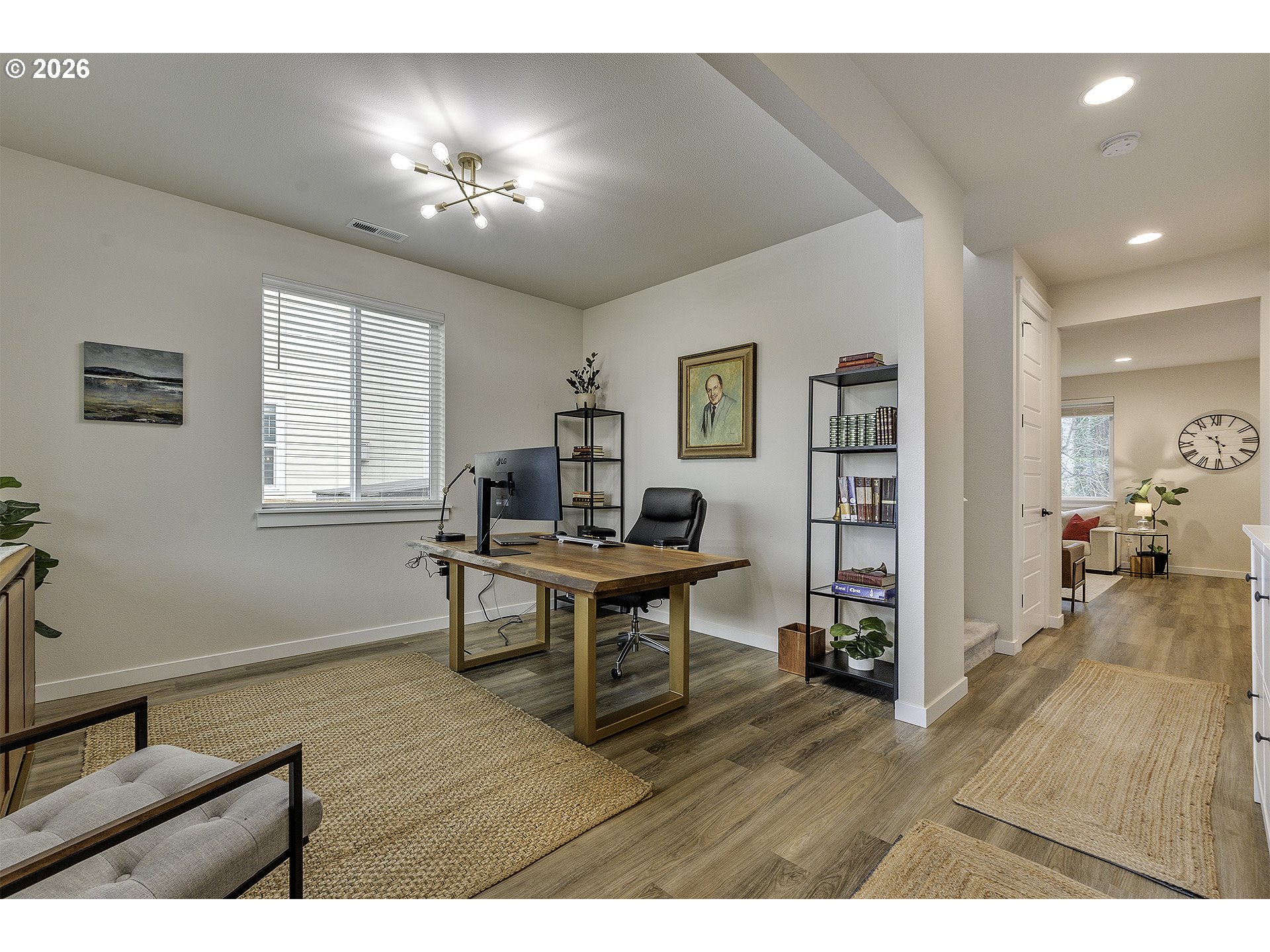 1156 Tansy Lane Canby, OR 97013 - Photo 4 of 35 a view of a workspace with furniture and a window