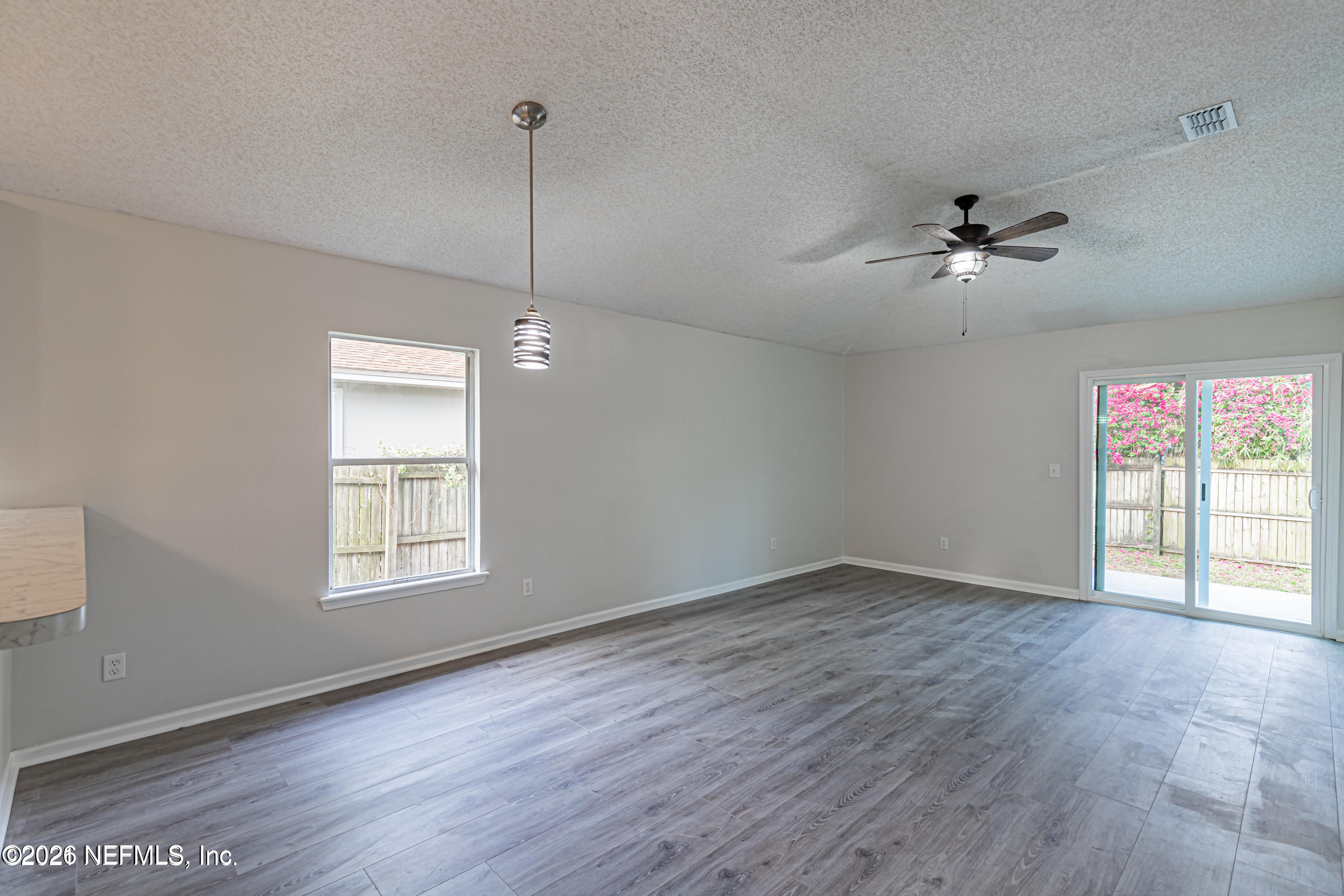 286 Main Street Atlantic Beach, FL 32233 - Photo 3 of 46 a view of an empty room with a window