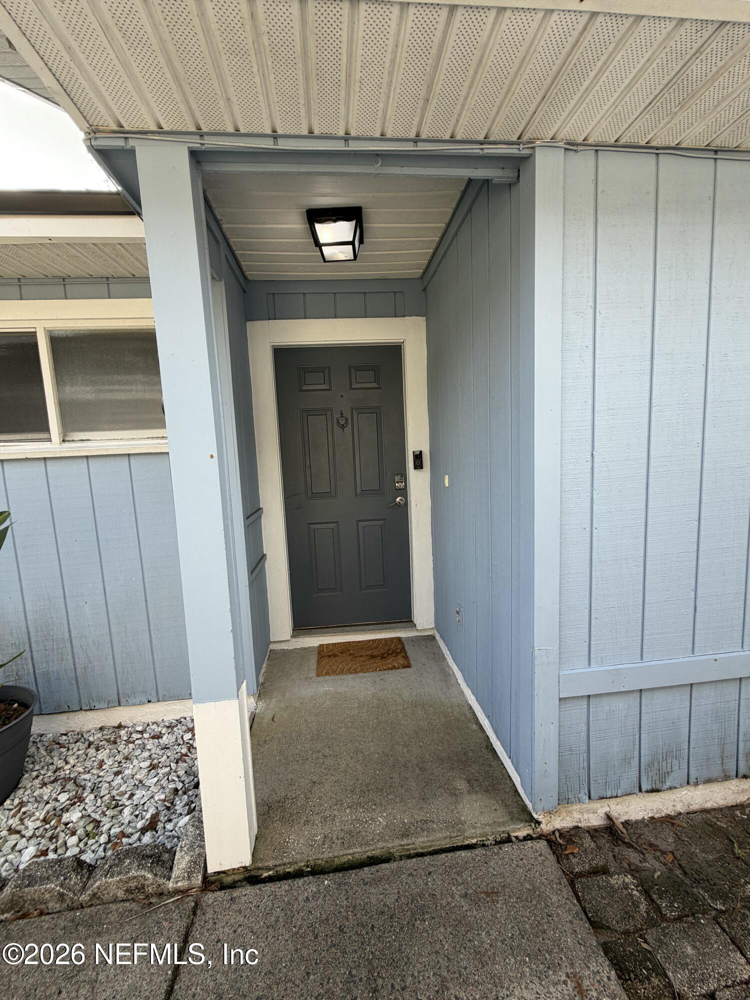 286 Main Street Atlantic Beach, FL 32233 - Photo 37 of 46 a view of a door and a house