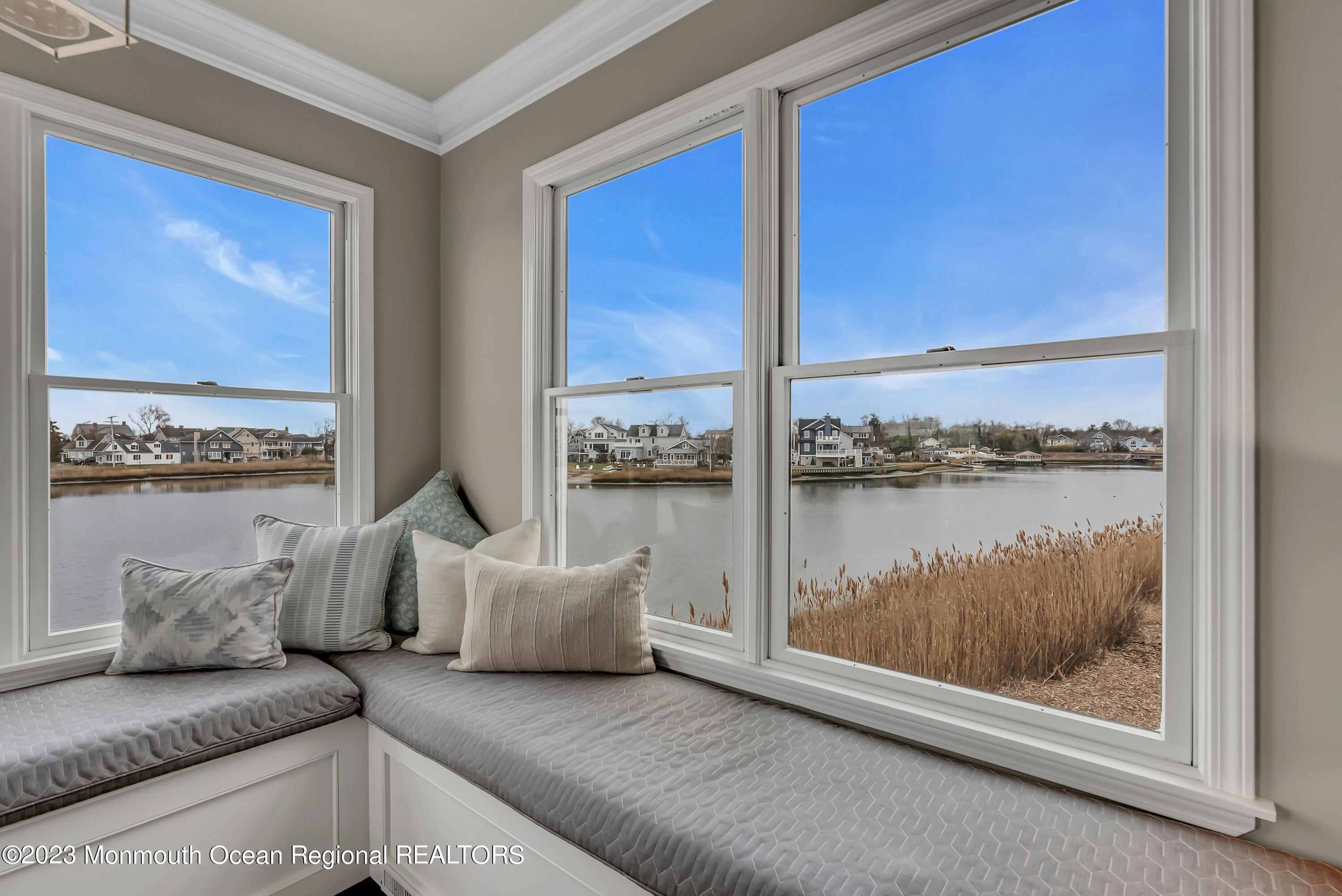 4 Waters Edge Brielle, NJ 08730 - Photo 2 of 66 a living room with furniture and a floor to ceiling window