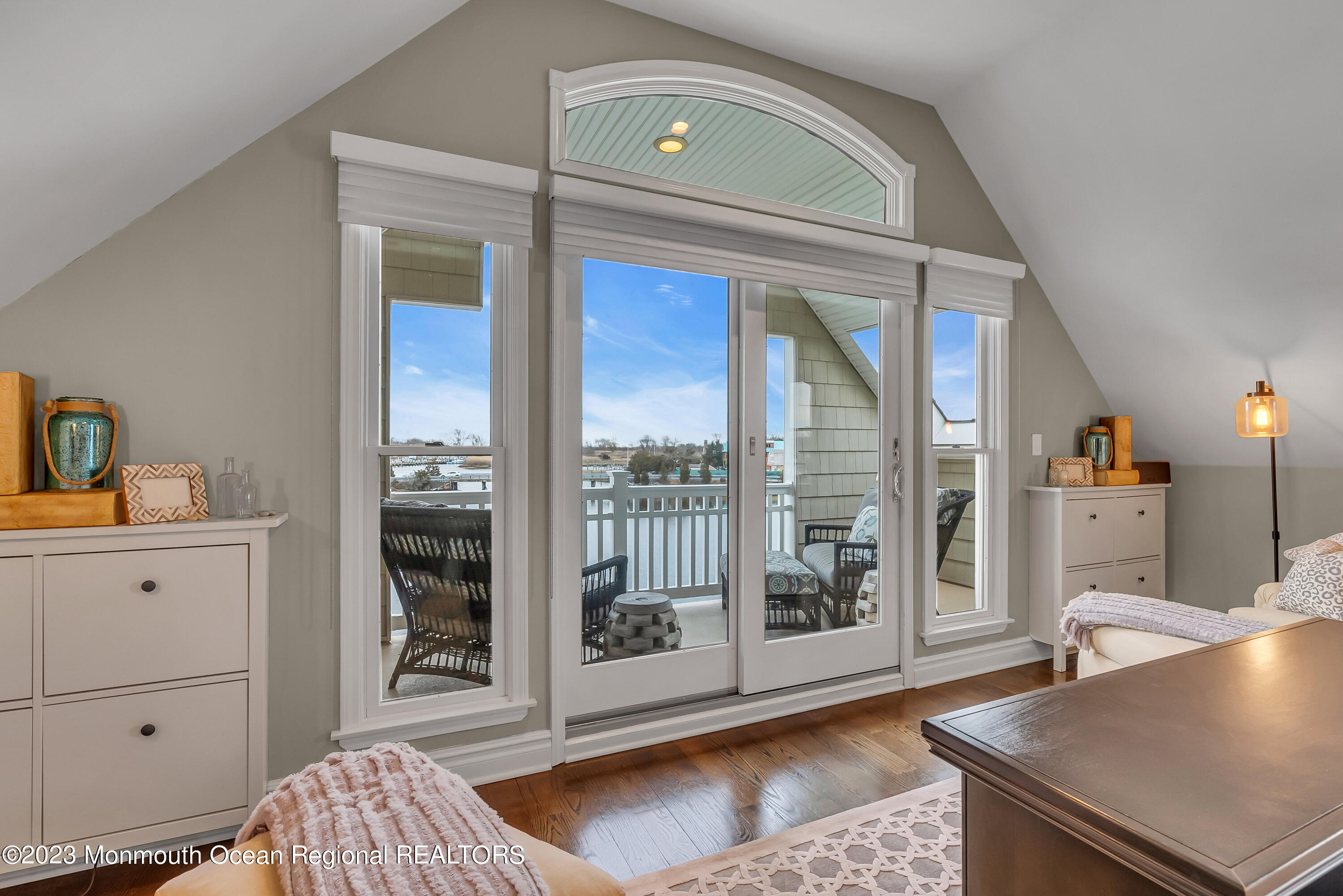 4 Waters Edge Brielle, NJ 08730 - Photo 25 of 66 a living room with a bed furniture and a window