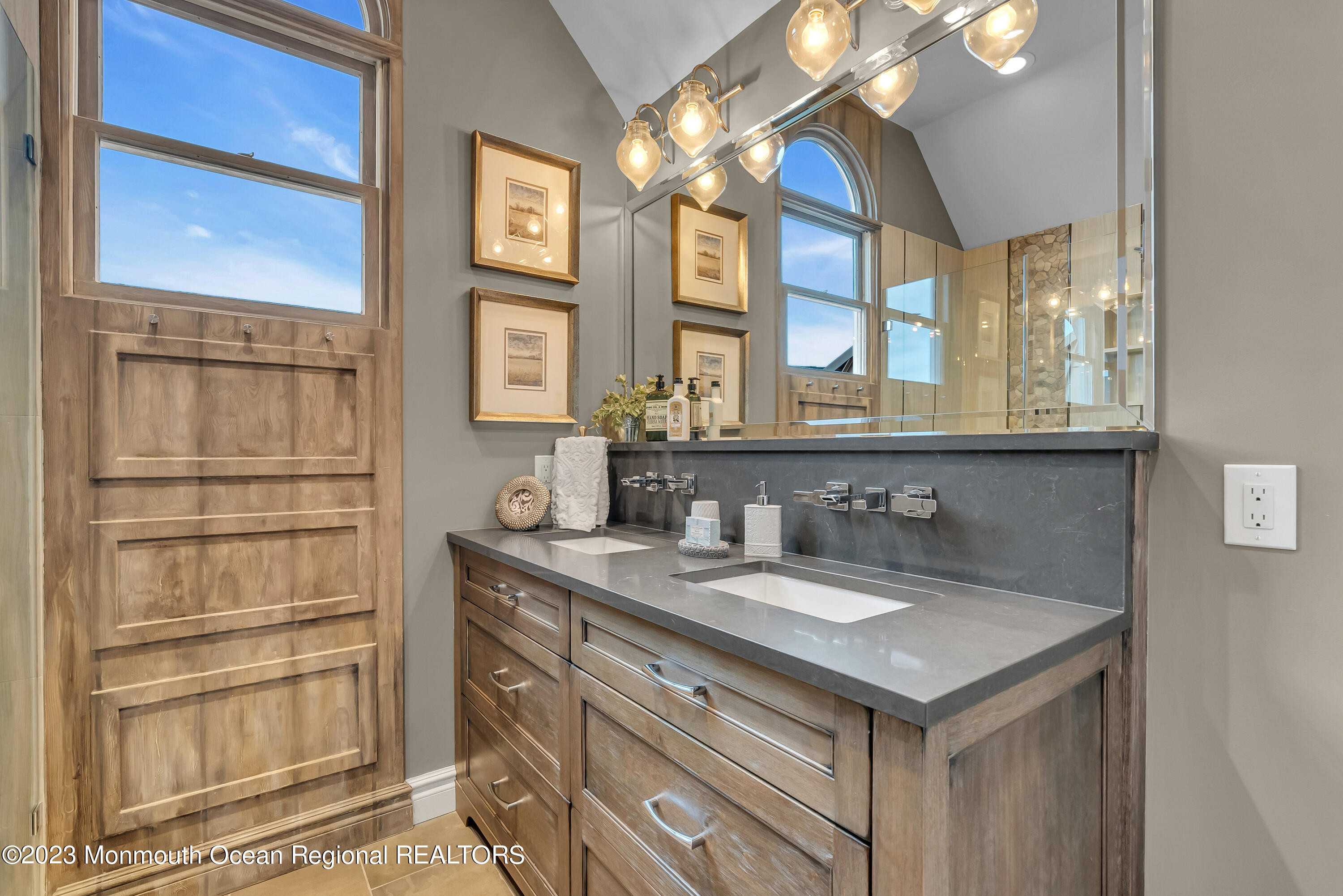 4 Waters Edge Brielle, NJ 08730 - Photo 26 of 66 a bathroom with a sink a vanity and a mirror