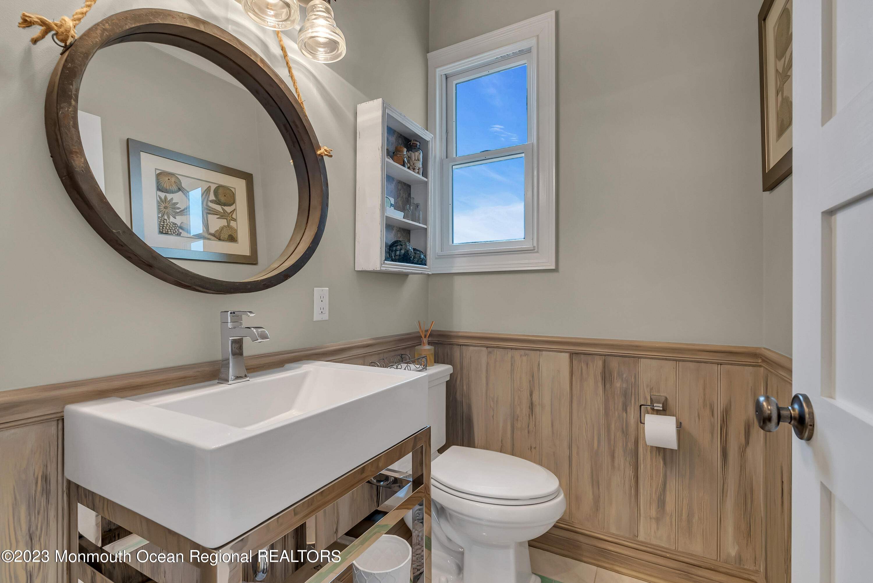 4 Waters Edge Brielle, NJ 08730 - Photo 30 of 66 a bathroom with a toilet a sink and a mirror