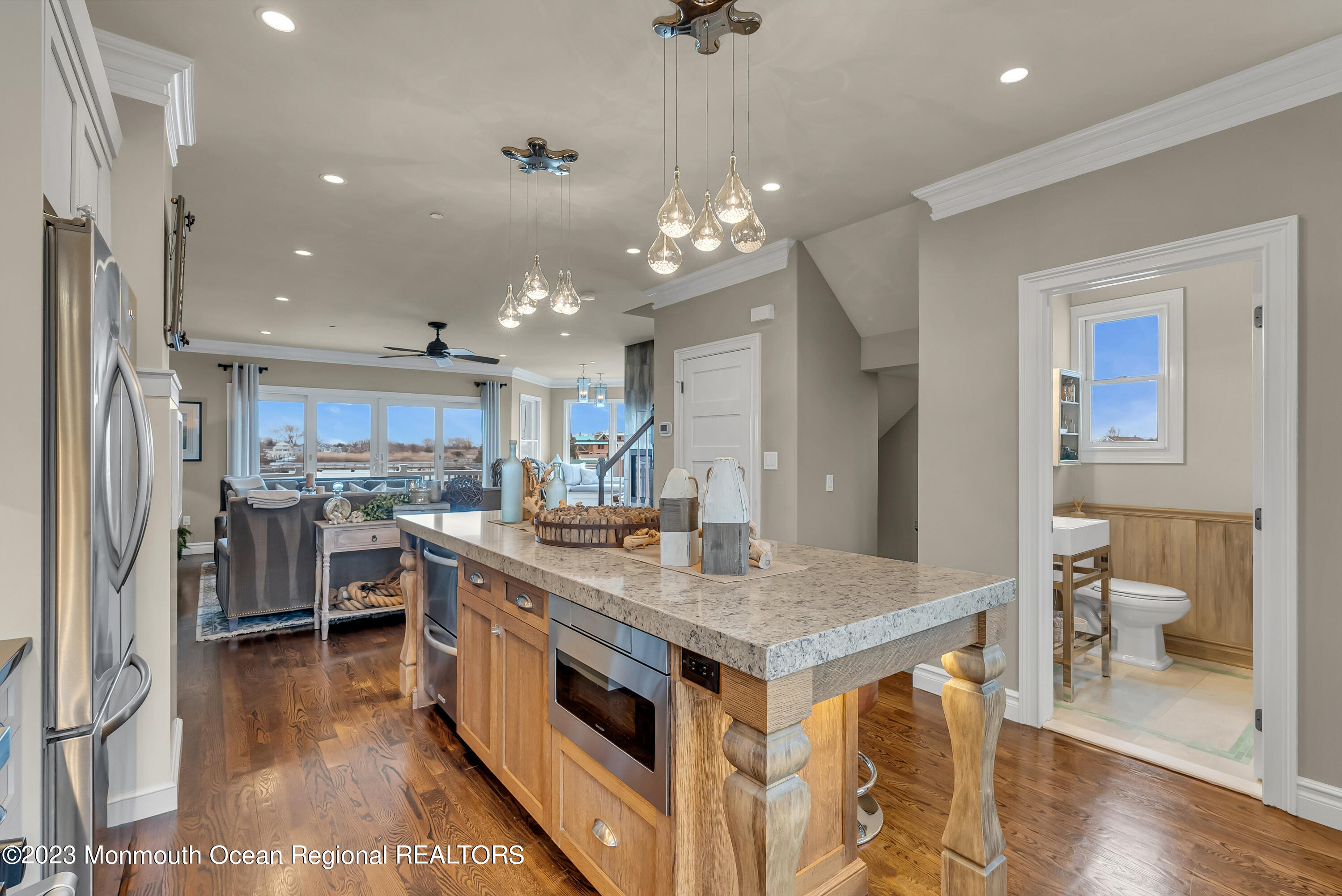 4 Waters Edge Brielle, NJ 08730 - Photo 33 of 66 a kitchen with a stove a refrigerator and a sink