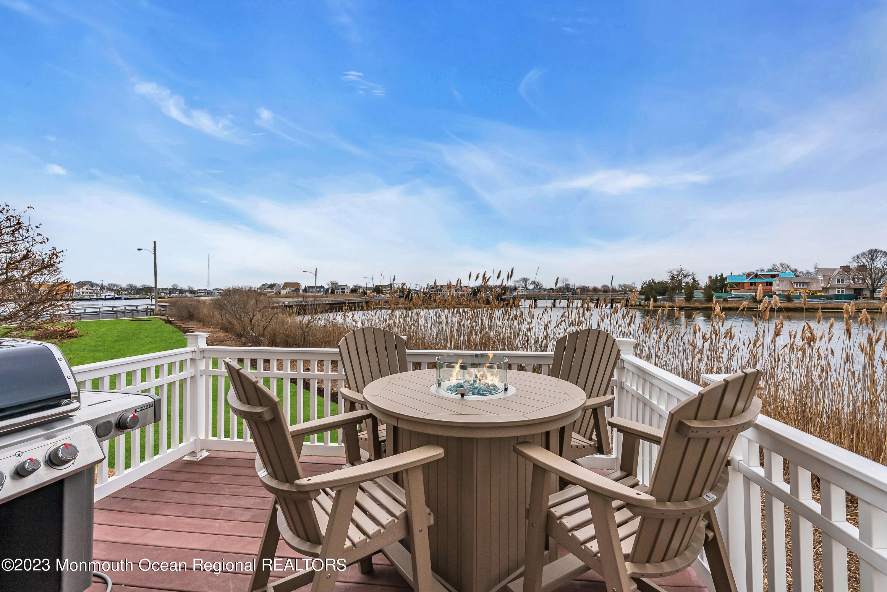 4 Waters Edge Brielle, NJ 08730 - Photo 46 of 66 a view of a roof deck with furniture and a lake view