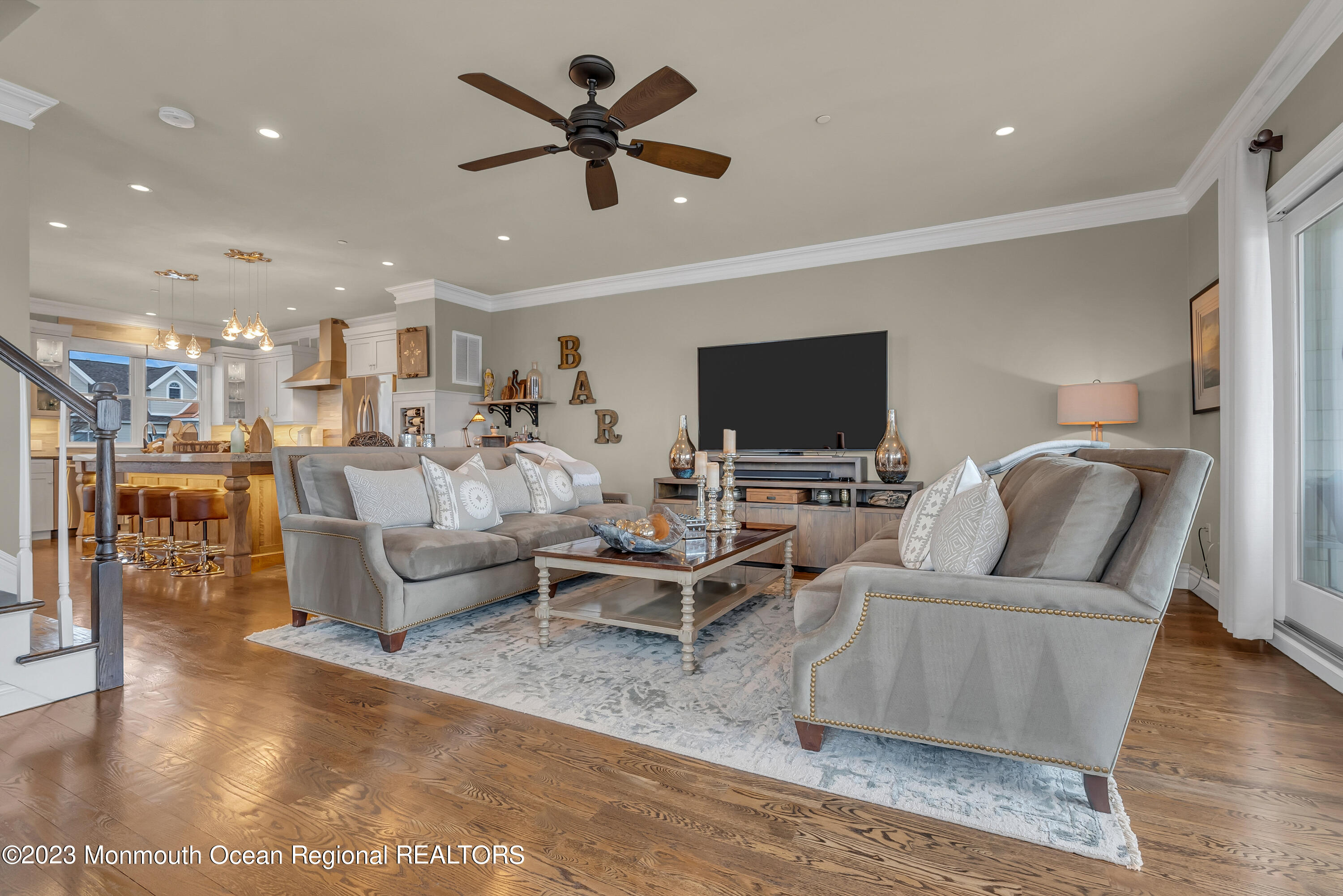 4 Waters Edge Brielle, NJ 08730 - Photo 50 of 66 a living room with furniture and a flat screen tv
