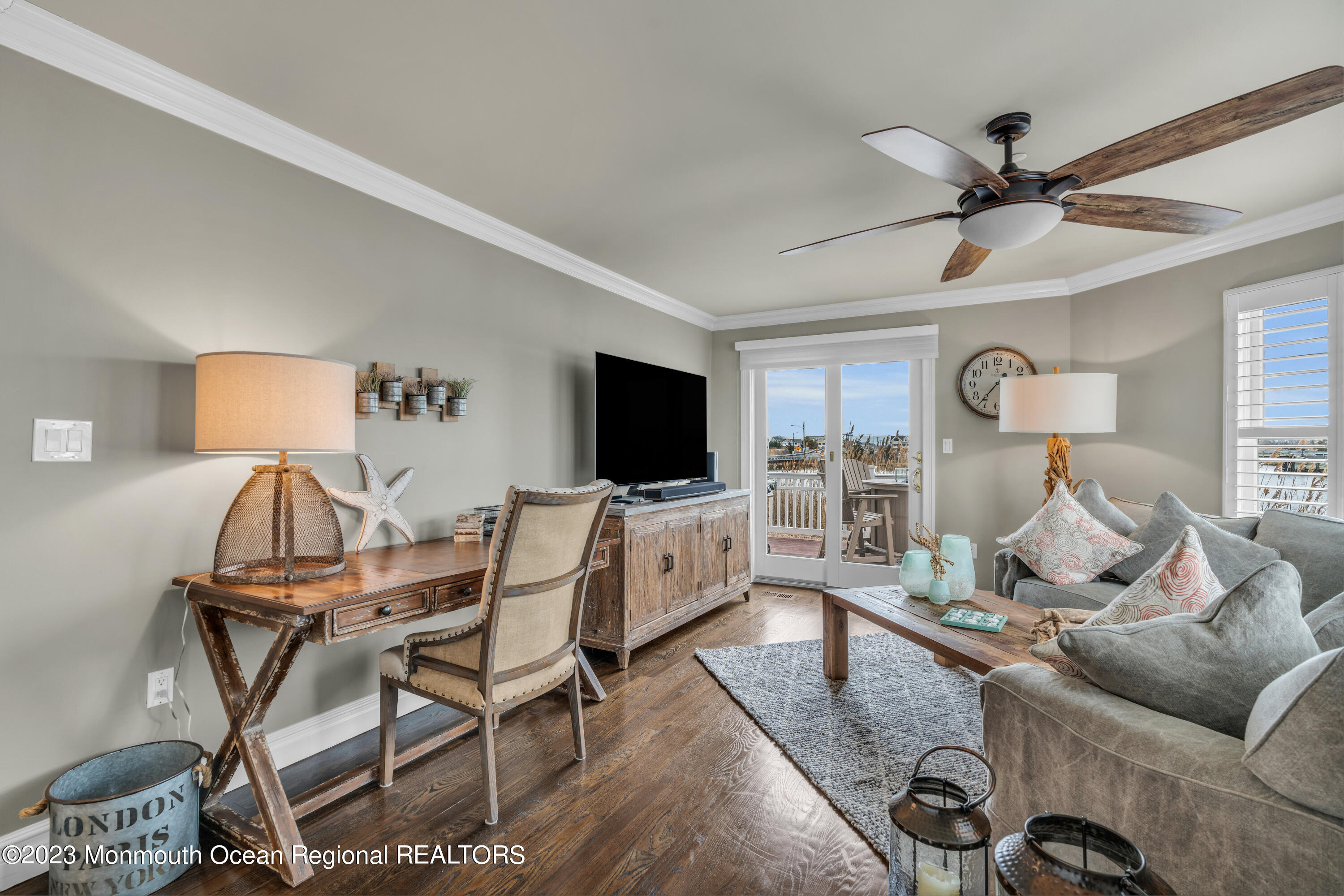 4 Waters Edge Brielle, NJ 08730 - Photo 52 of 66 a living room with furniture and a flat screen tv