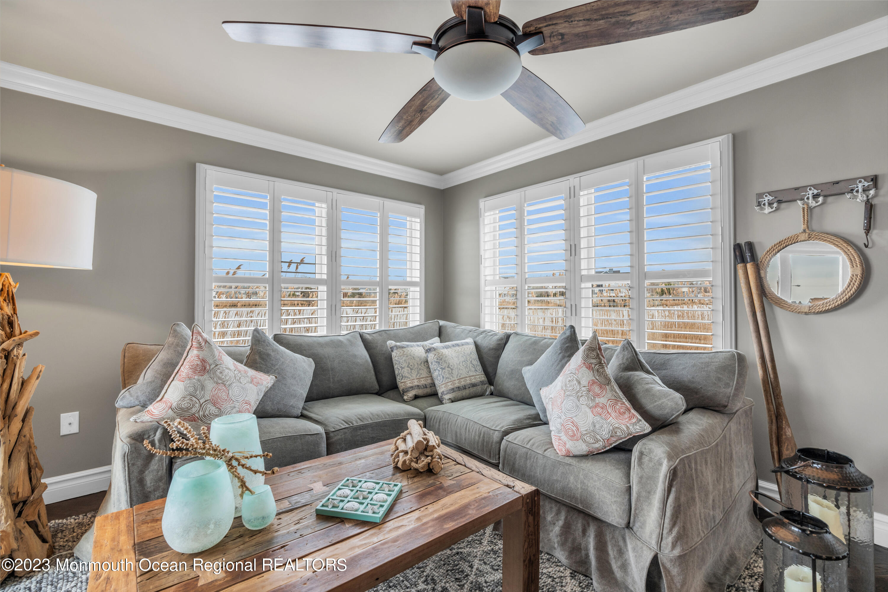 4 Waters Edge Brielle, NJ 08730 - Photo 53 of 66 a living room with furniture and a large window
