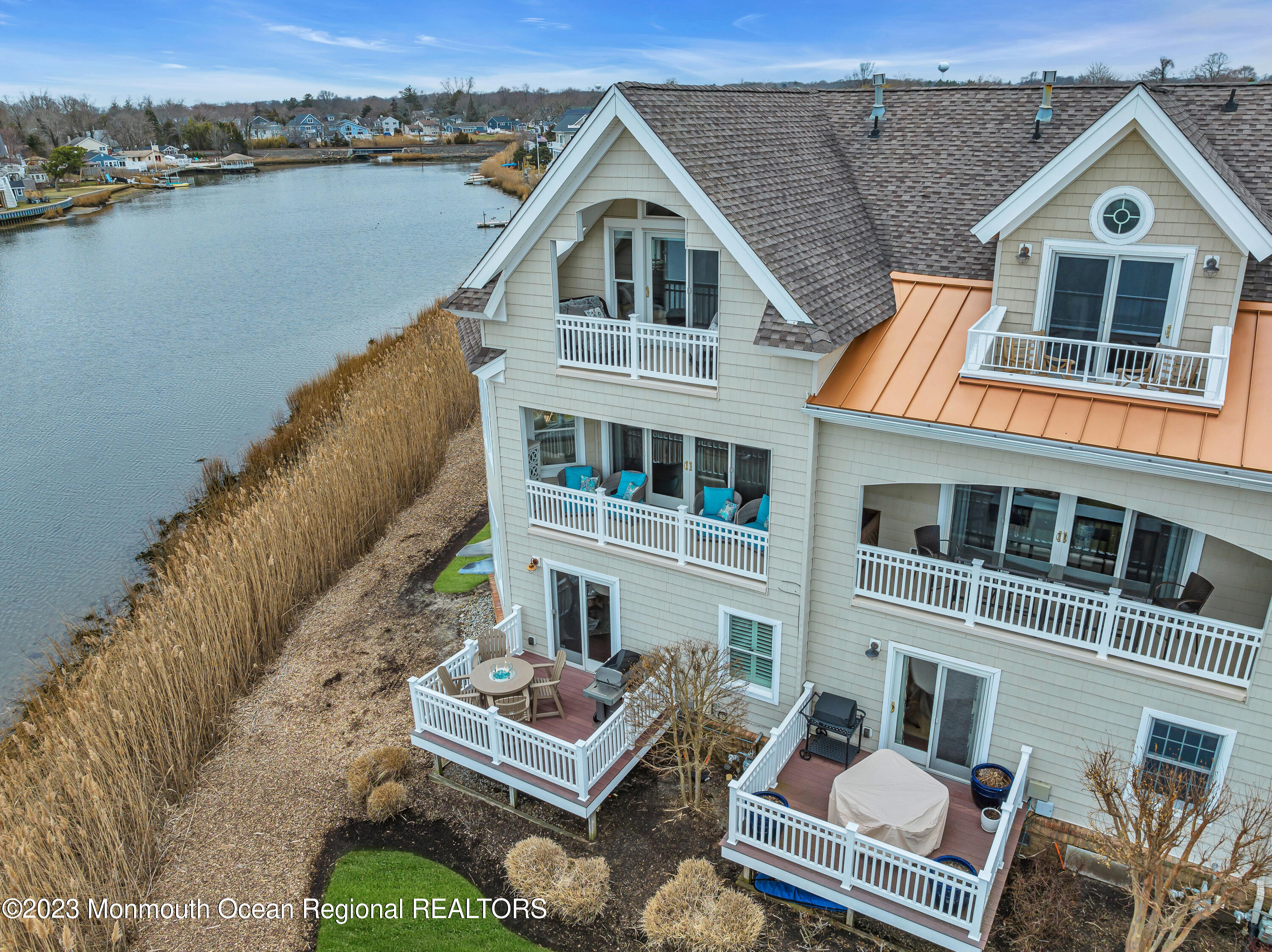 4 Waters Edge Brielle, NJ 08730 - Photo 60 of 66 a view of a house with a roof deck