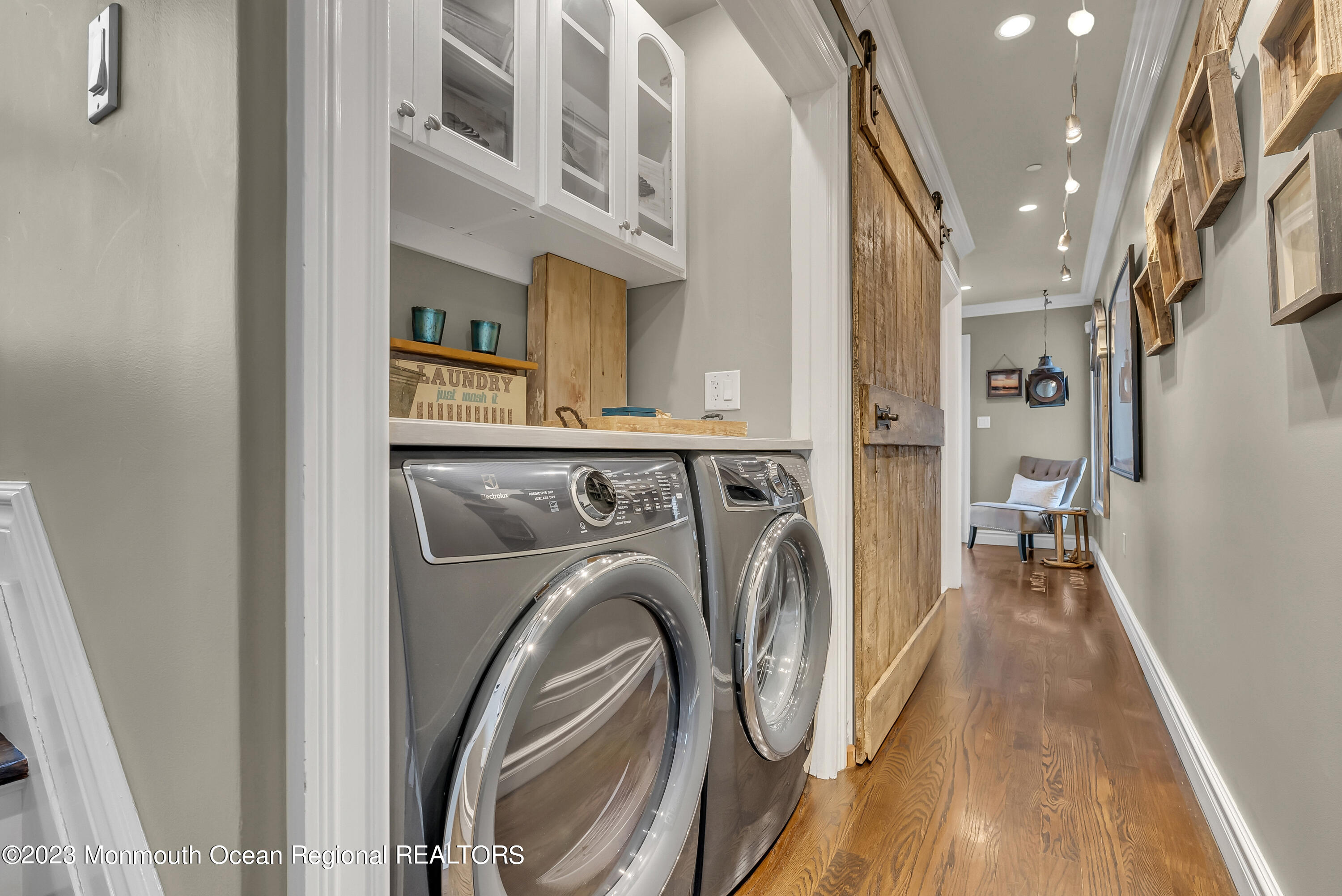 4 Waters Edge Brielle, NJ 08730 - Photo 62 of 66 a view of a hallway with washer and dryer