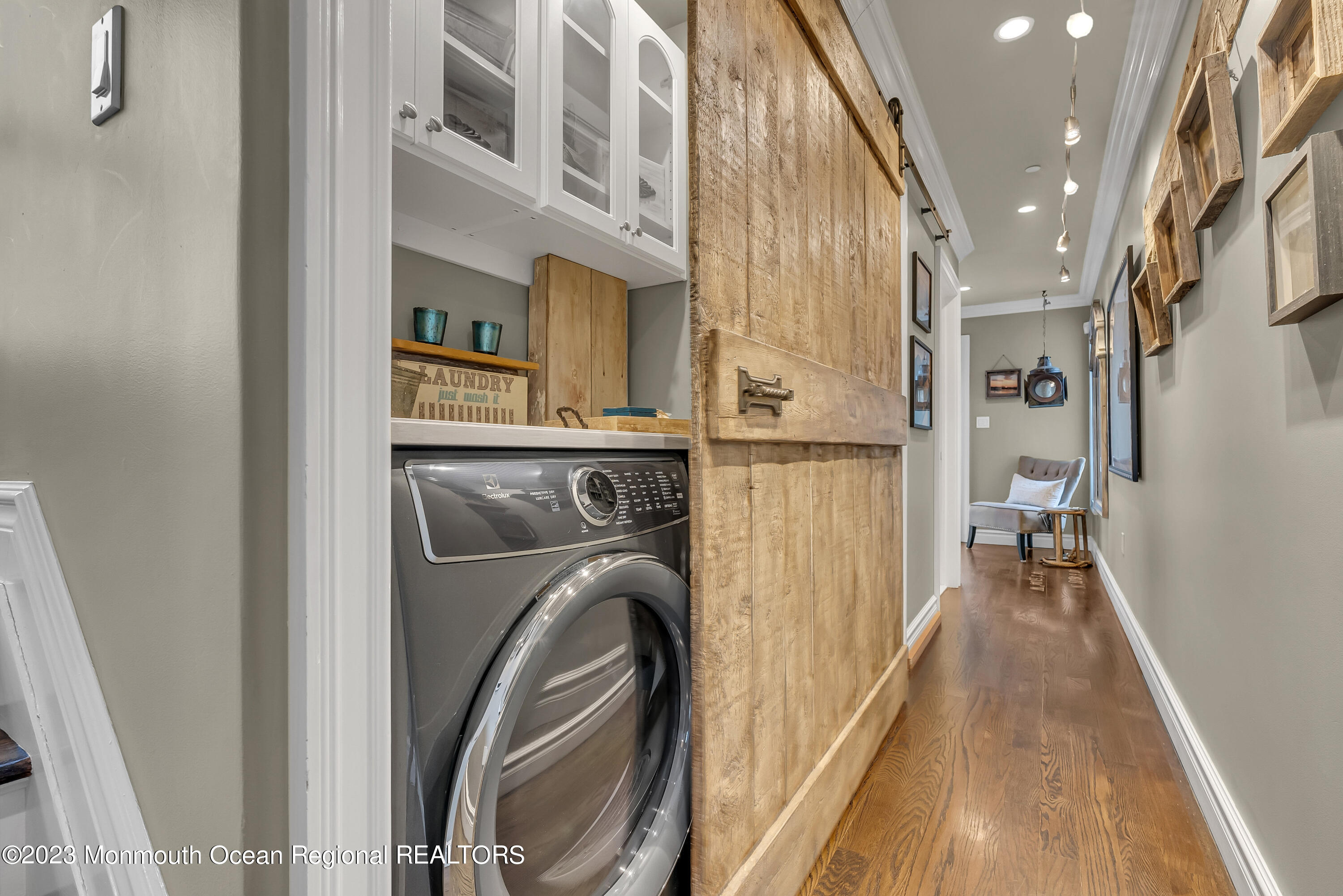 4 Waters Edge Brielle, NJ 08730 - Photo 63 of 66 a view of a hallway with washer and dryer