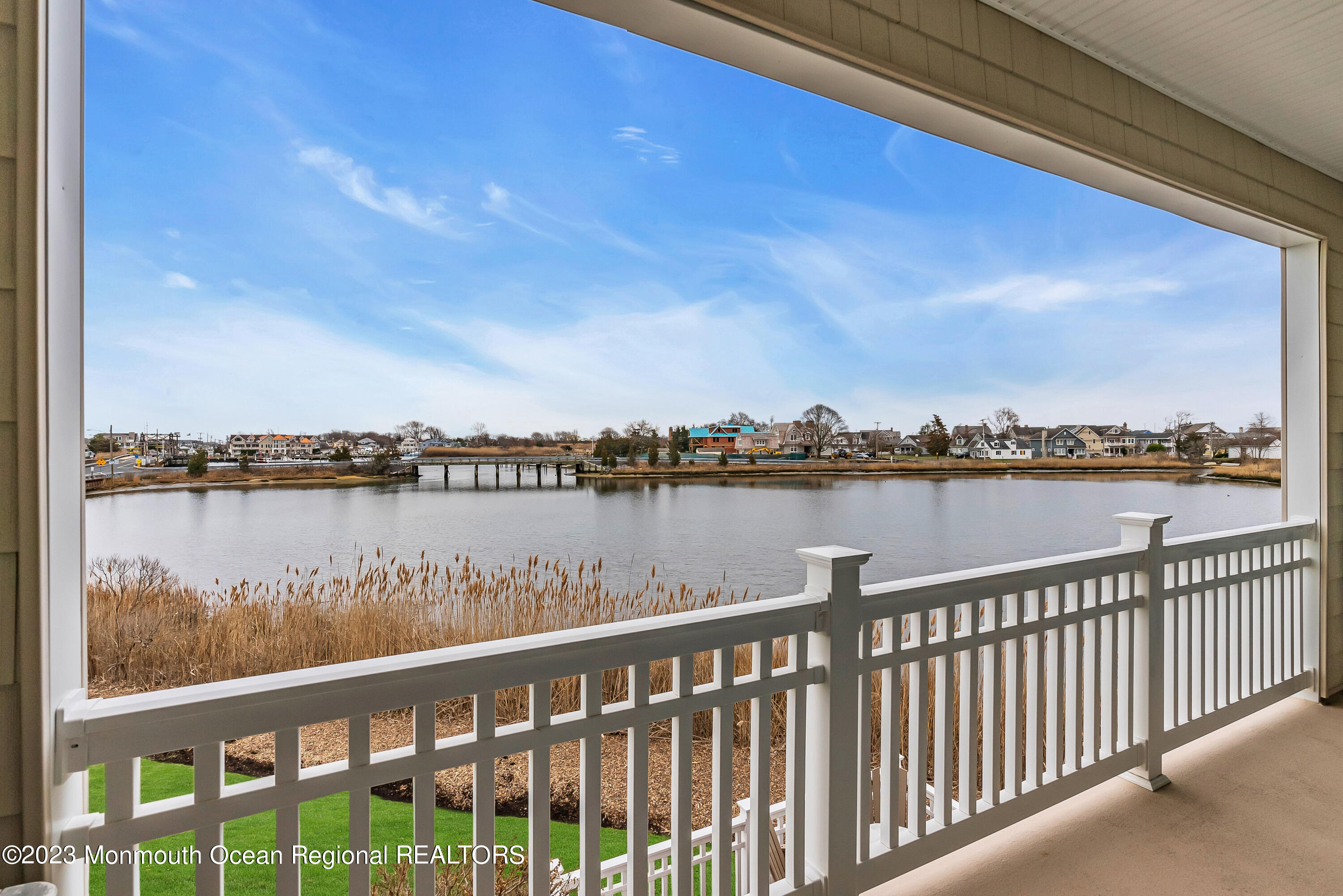 4 Waters Edge Brielle, NJ 08730 - Photo 7 of 66 a view of a lake from a balcony