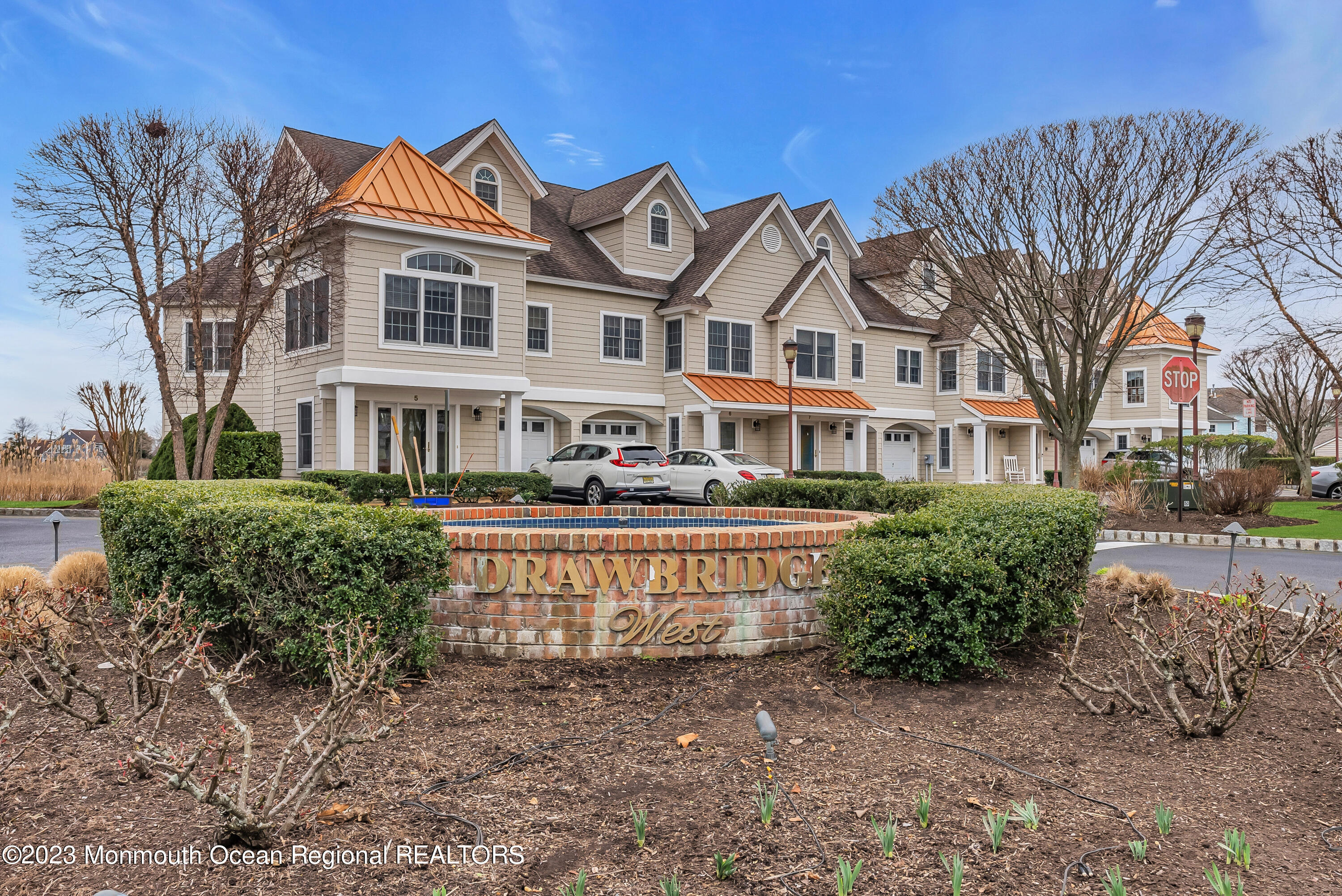 4 Waters Edge Brielle, NJ 08730 - Photo 8 of 66 a front view of a house with a yard