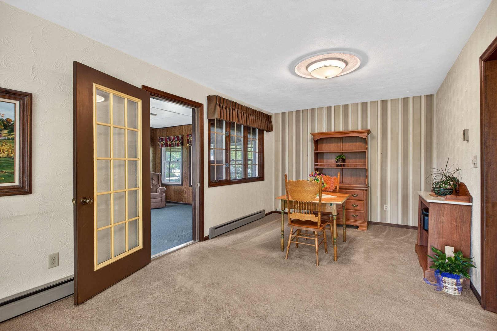 2660 252nd Street De Witt, IA 52742 - Photo 21 of 45 a dining room with furniture and a window