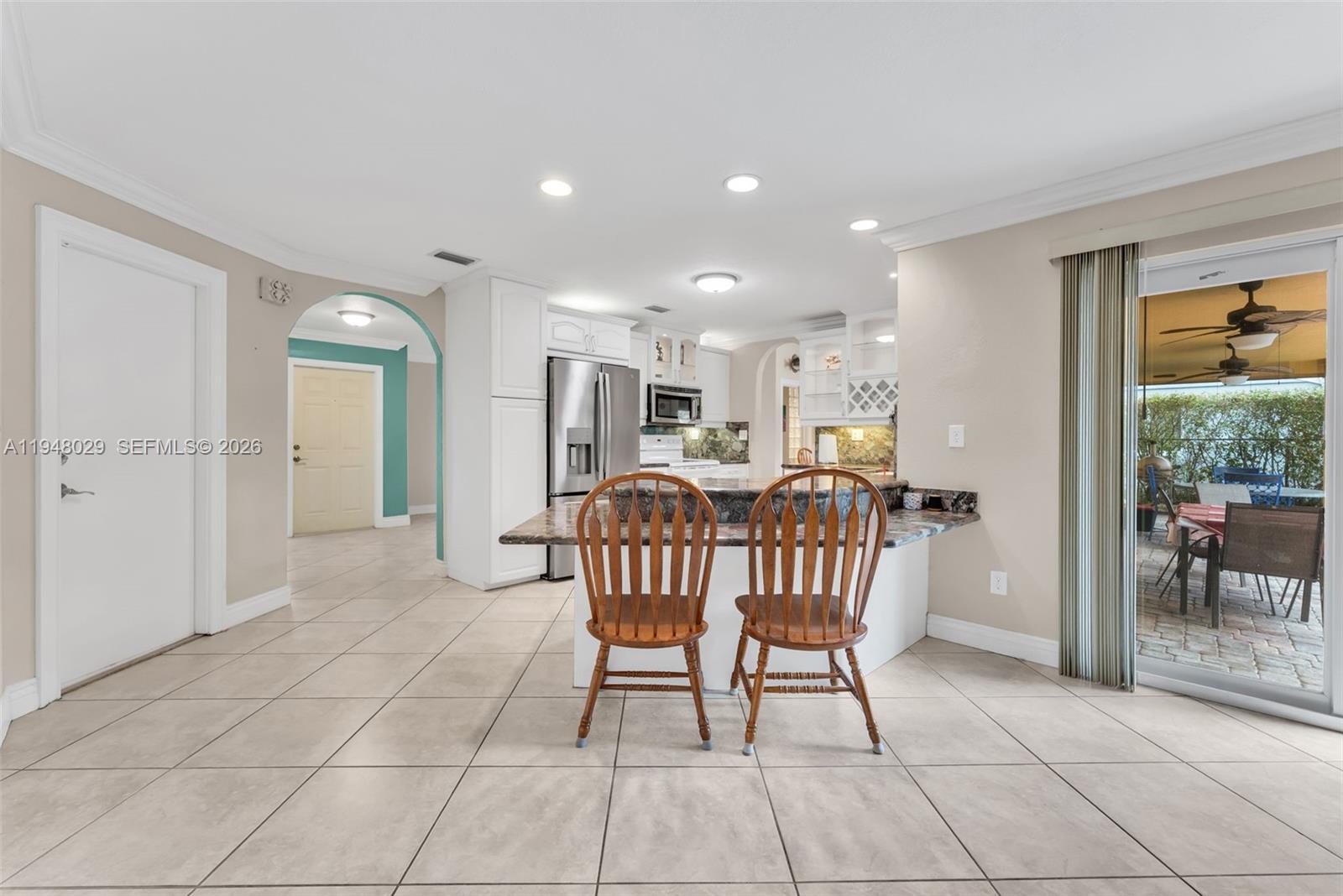 11628 Southwest 50th Street Cooper City, FL 33330 - Photo 13 of 22 a view of a dining room with furniture window and outside view