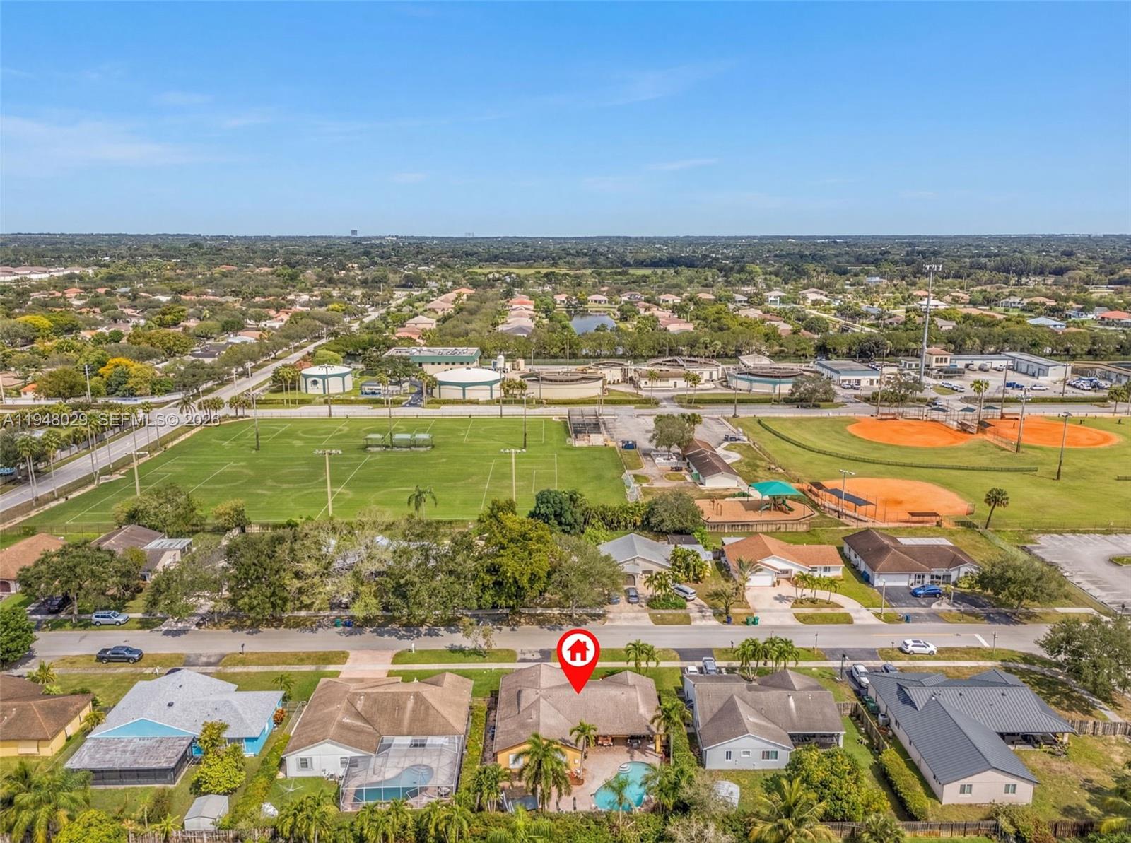 11628 Southwest 50th Street Cooper City, FL 33330 - Photo 20 of 22 an aerial view of residential building and lake