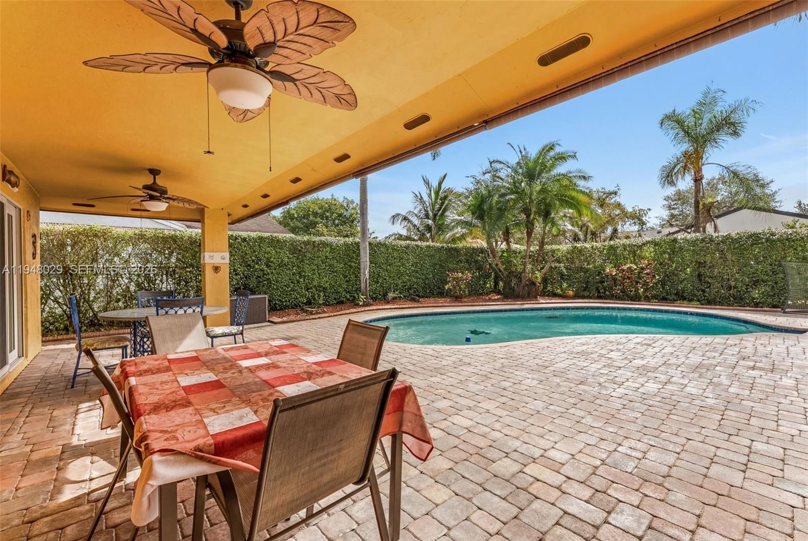 11628 Southwest 50th Street Cooper City, FL 33330 - Photo 22 of 22 a outdoor view with a sitting space